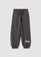 Pantaloni jogger grigi in puro cotone con fondo elastico_0