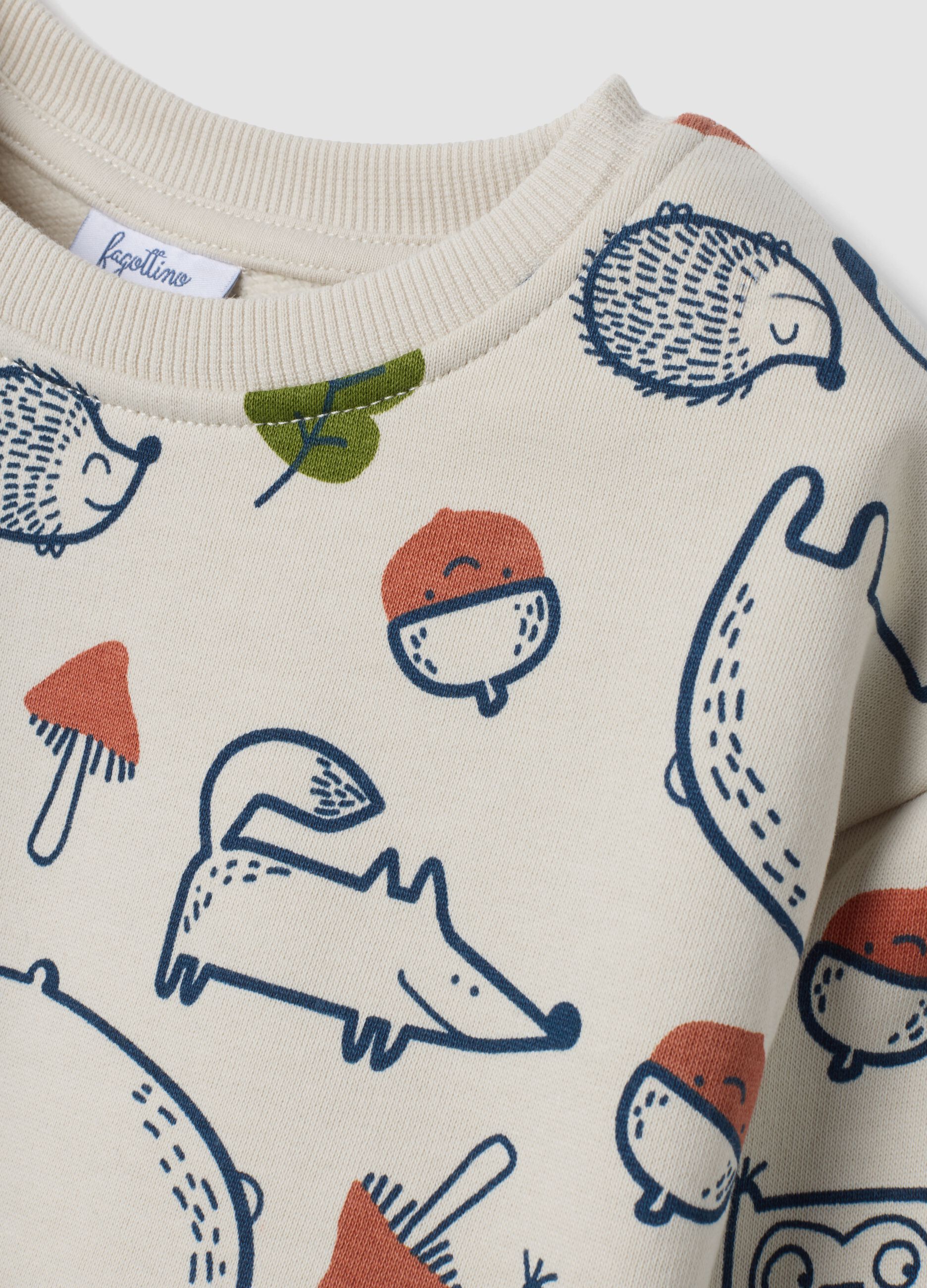 Felpa beige in puro cotone con girocollo e stampa animali over fit