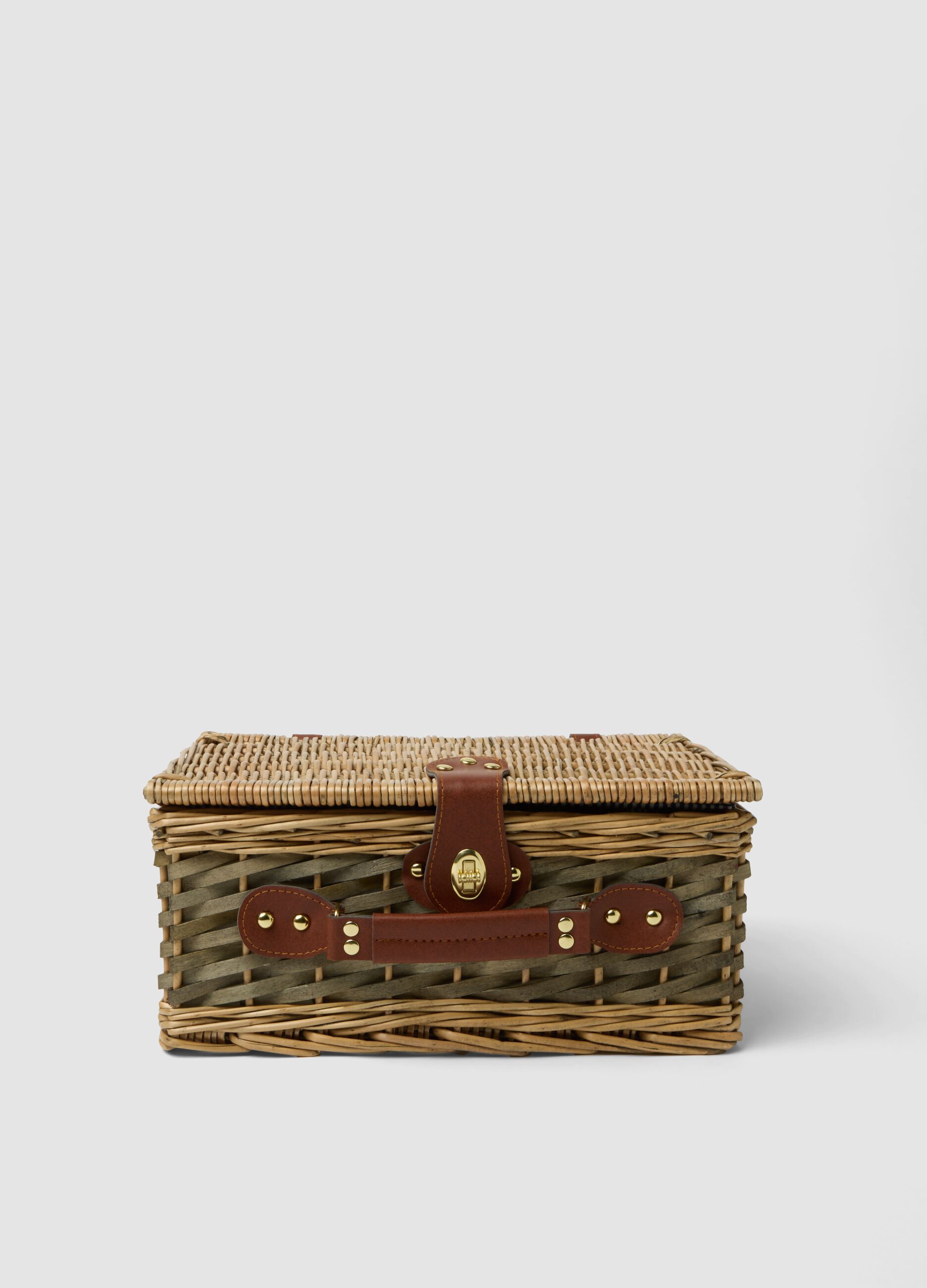 Brown picnic basket with striped lining
