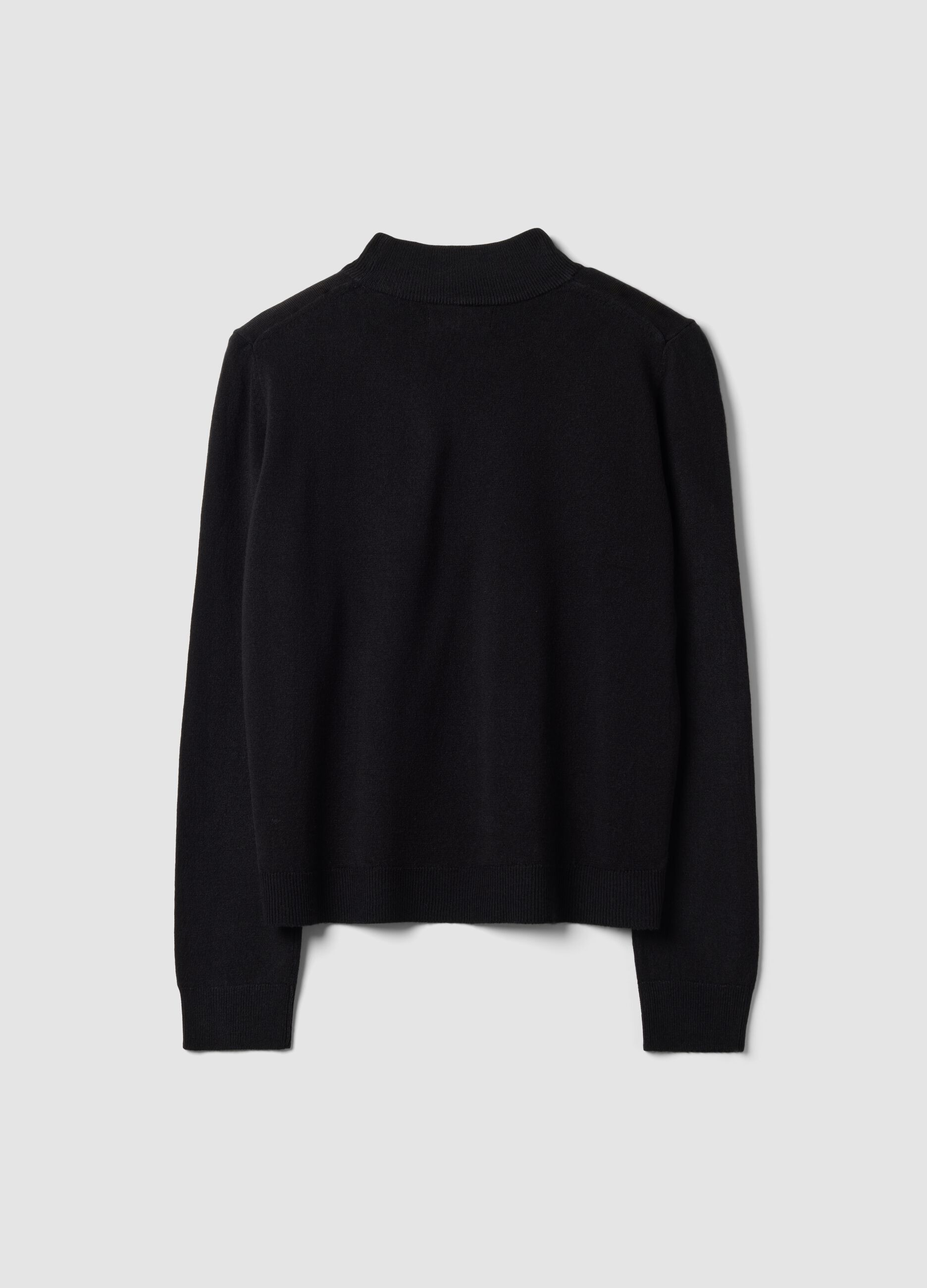 Black long-sleeve top with raised neckline, regular fit