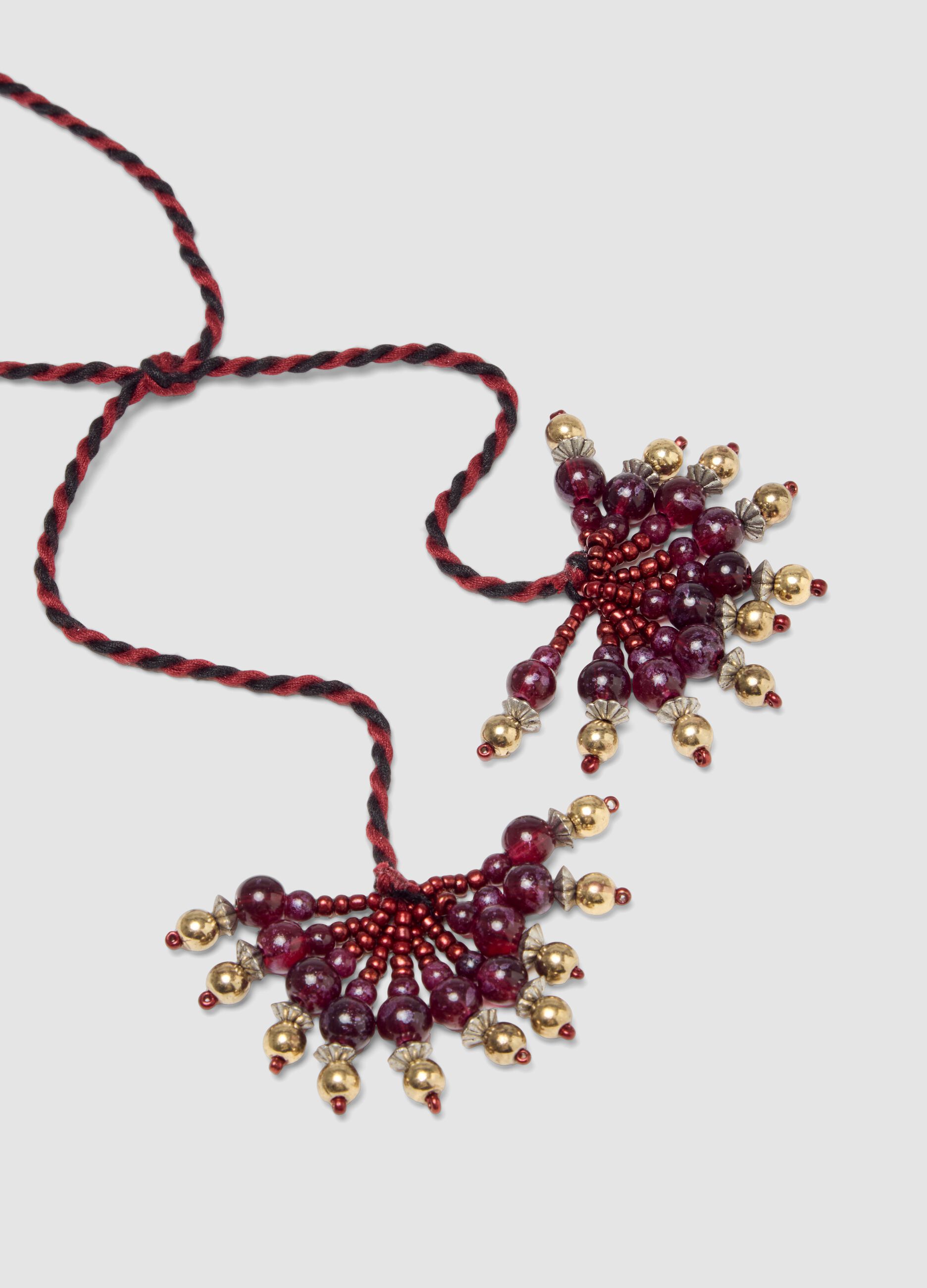 Collana viola vinaccia a tre fili con perline