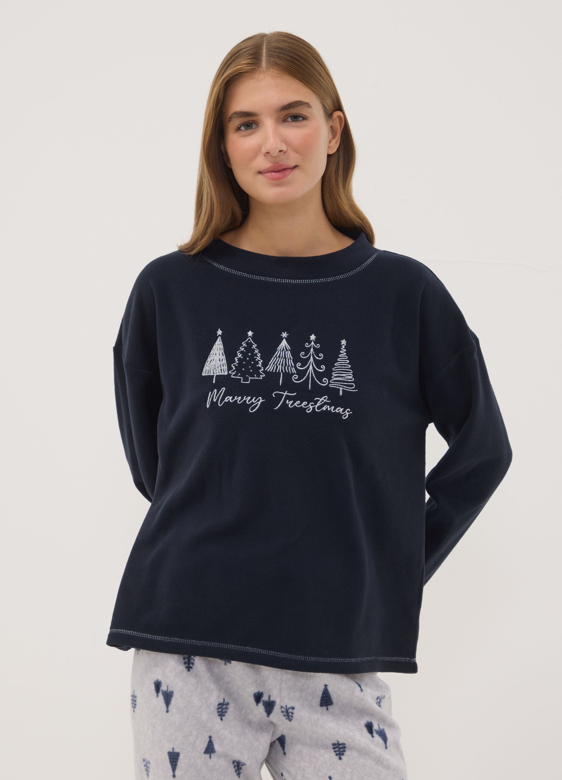 Navy fleece pyjamas with crew neck top and printed trousers