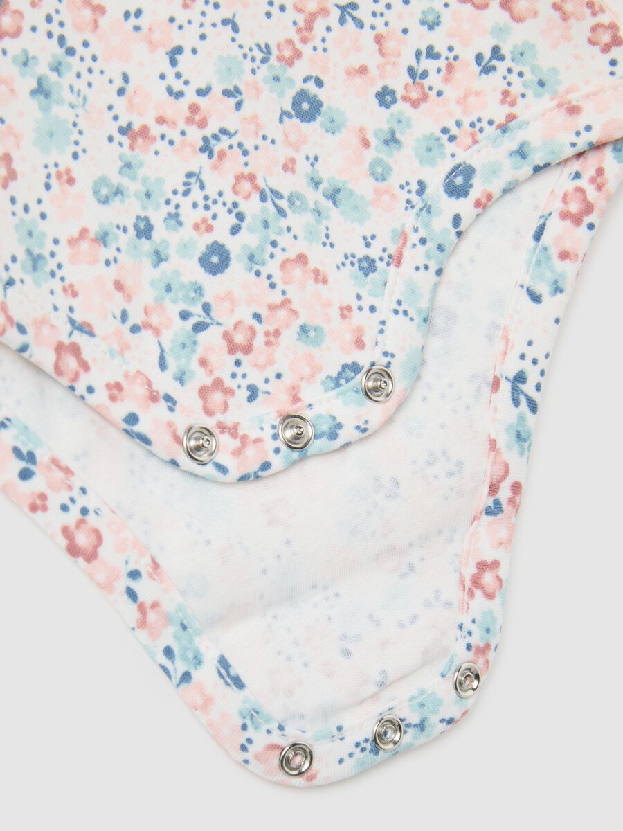 Baby girl's bodysuit in multicolour pure cotton with ruffle collar_3