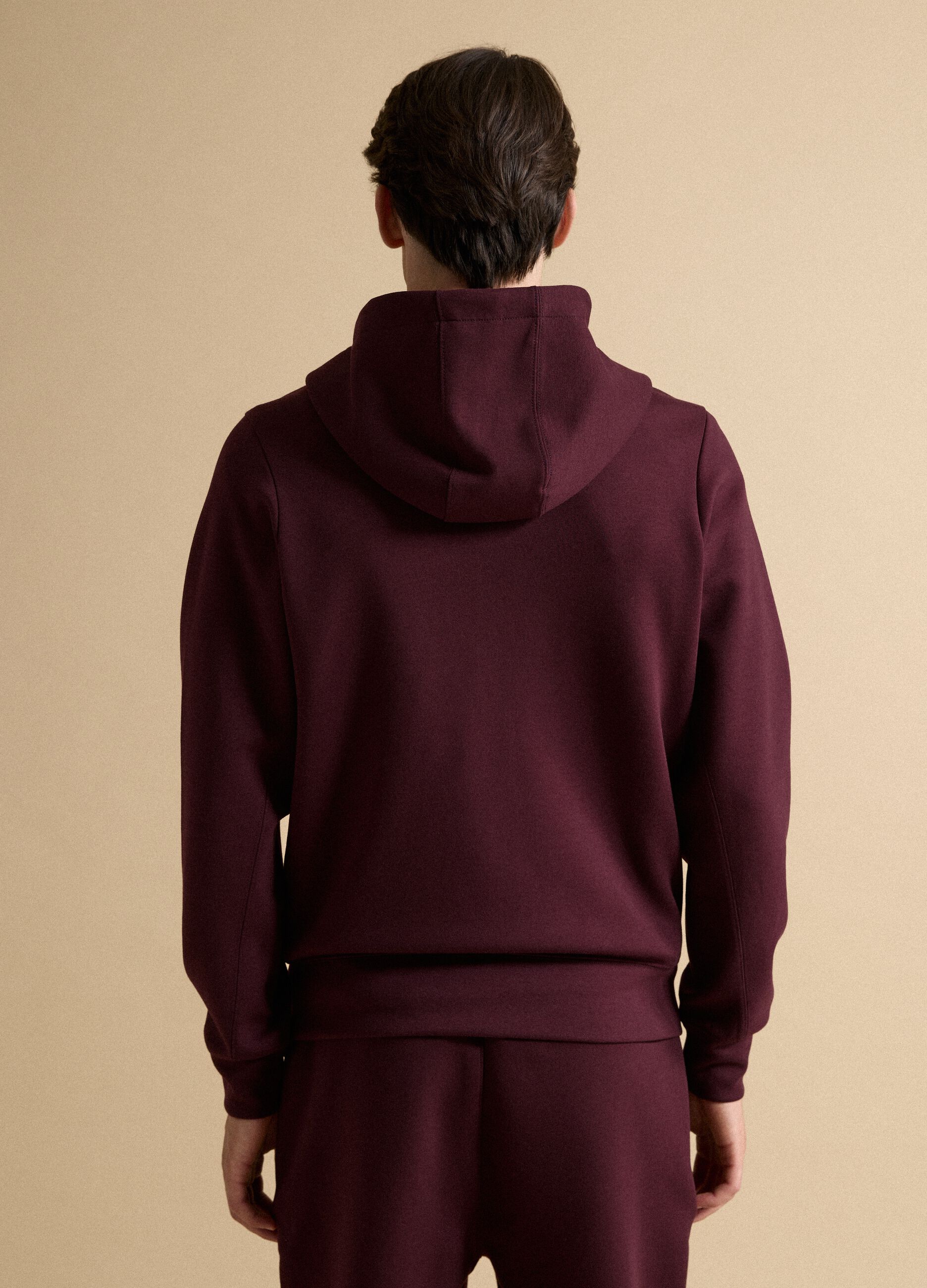 Breathable red full-zip in 2-Way Stretch fabric