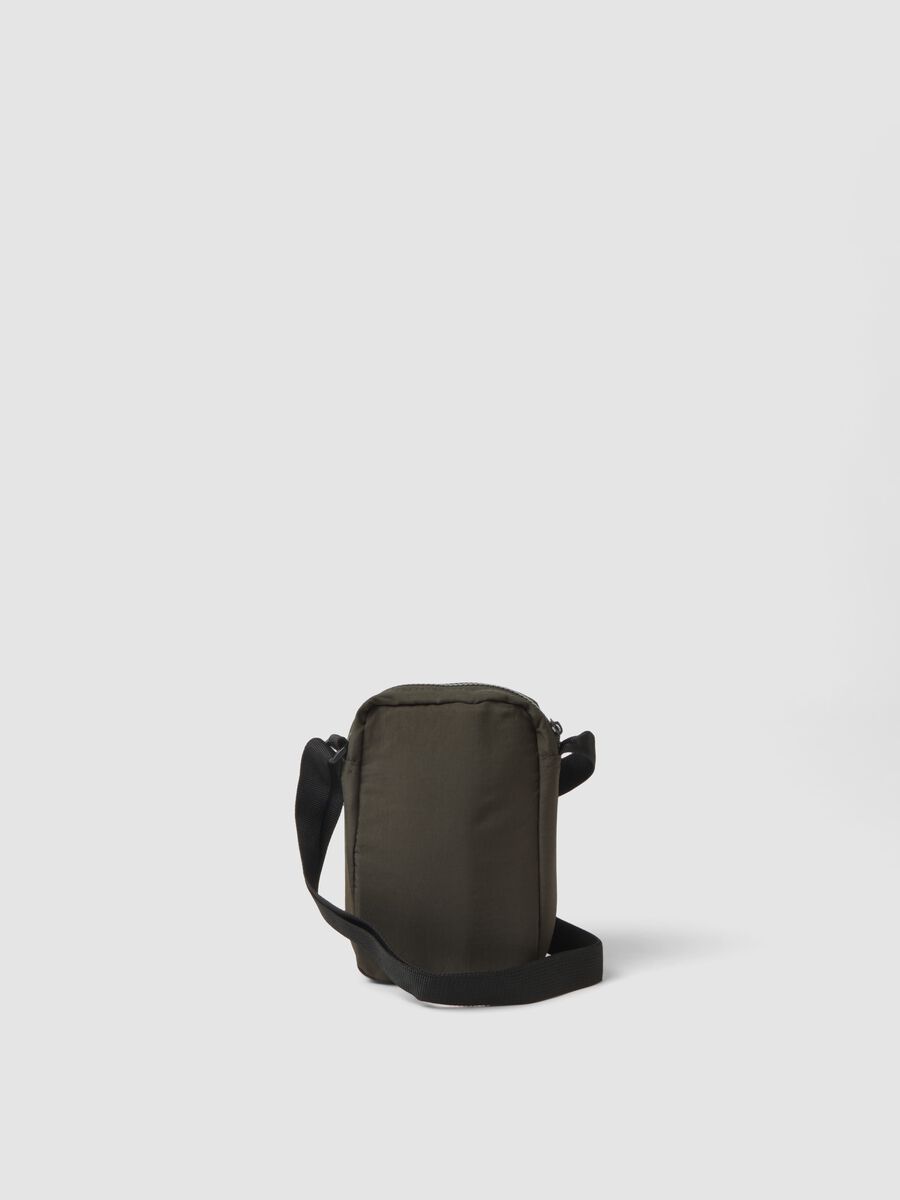 Green crossbody bag with zip closure and adjustable strap_1