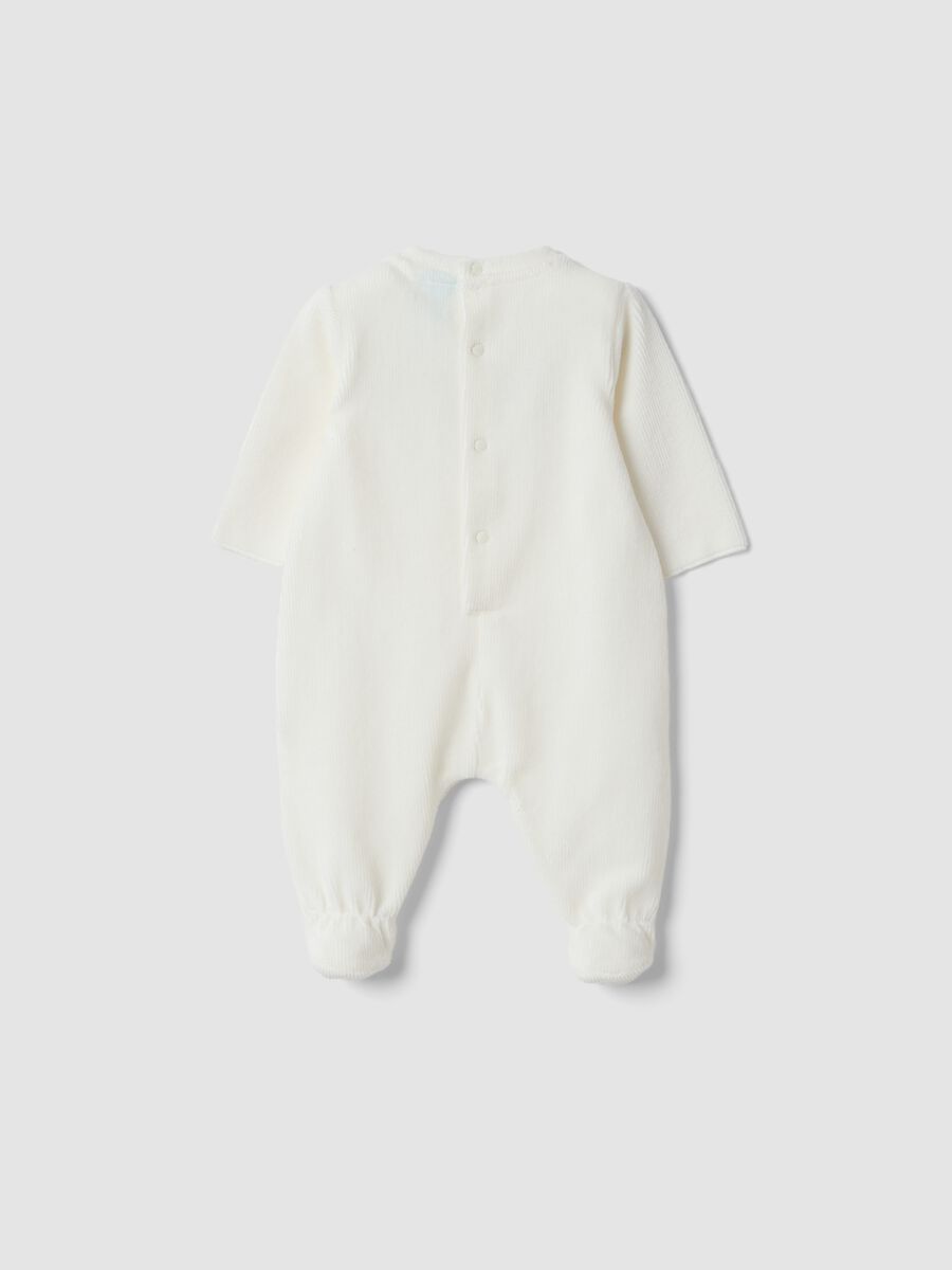 Tutina bianca in cotone organico elasticizzato con piedini e stampa Minnie_1
