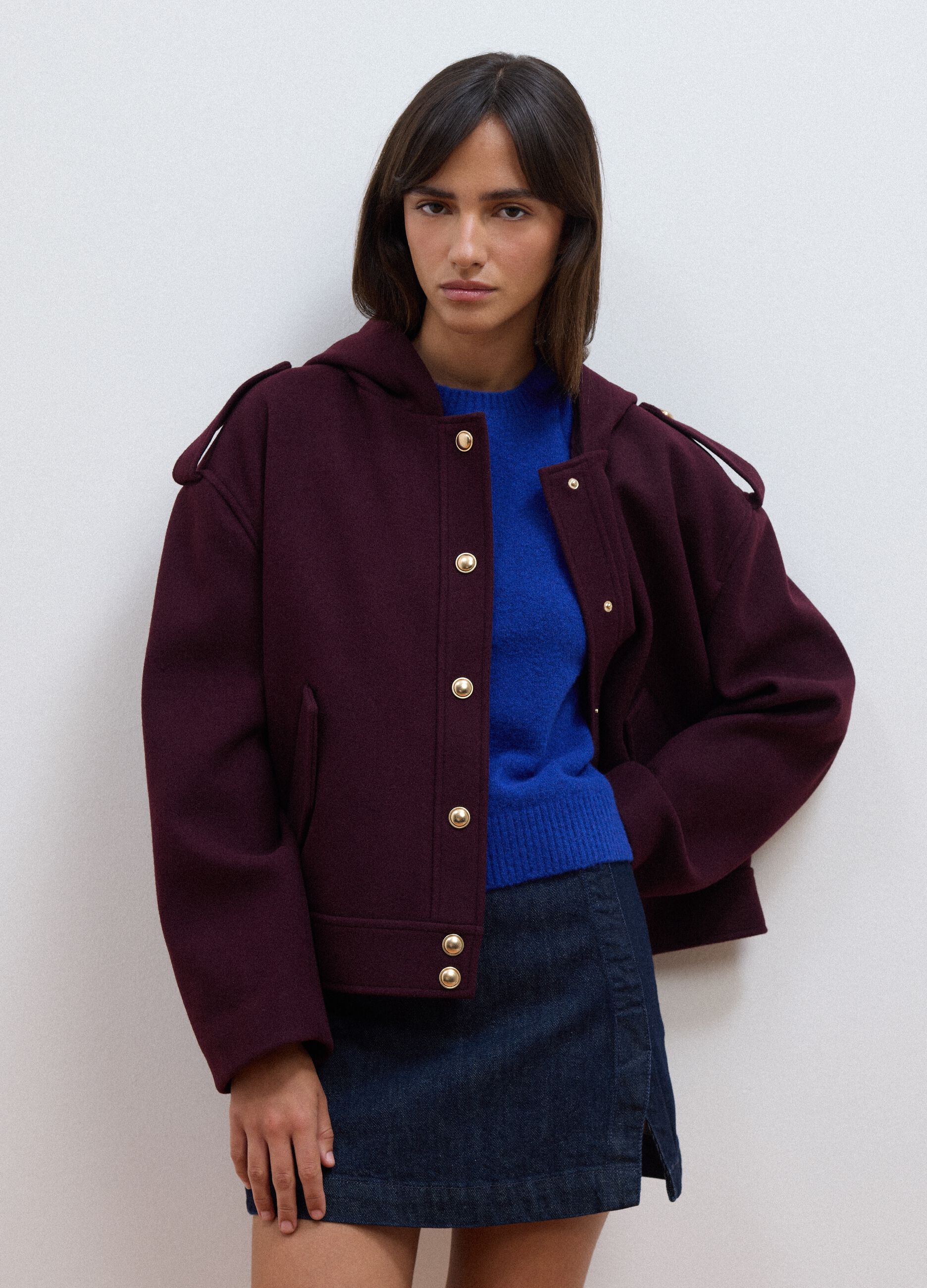 Purple hooded jacket with press-stud fastening