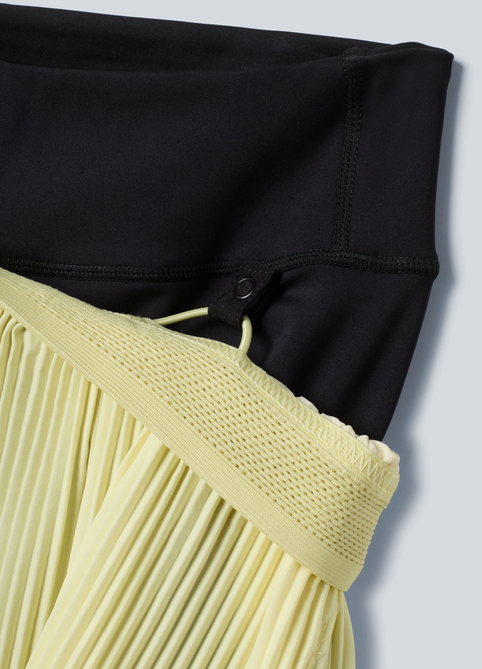 ALTAVIA COURT yellow pleated sports shorts in stretch fabric with removable inner short