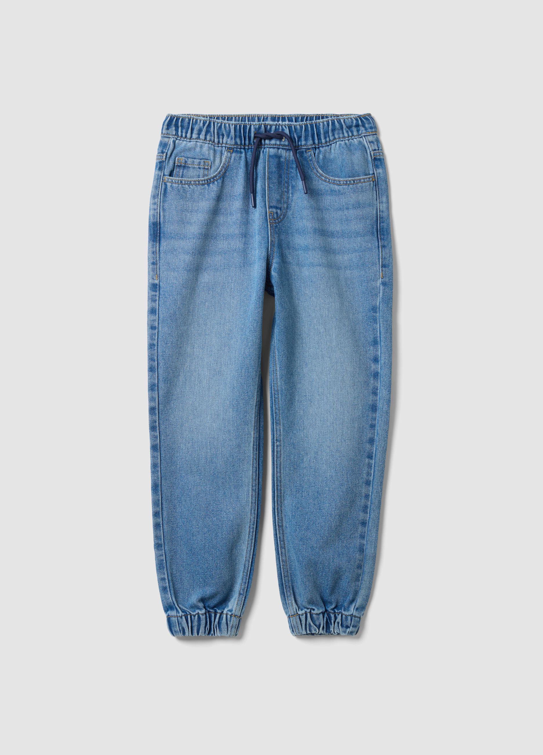 Blue denim jogger jeans in a cotton and viscose blend for boys