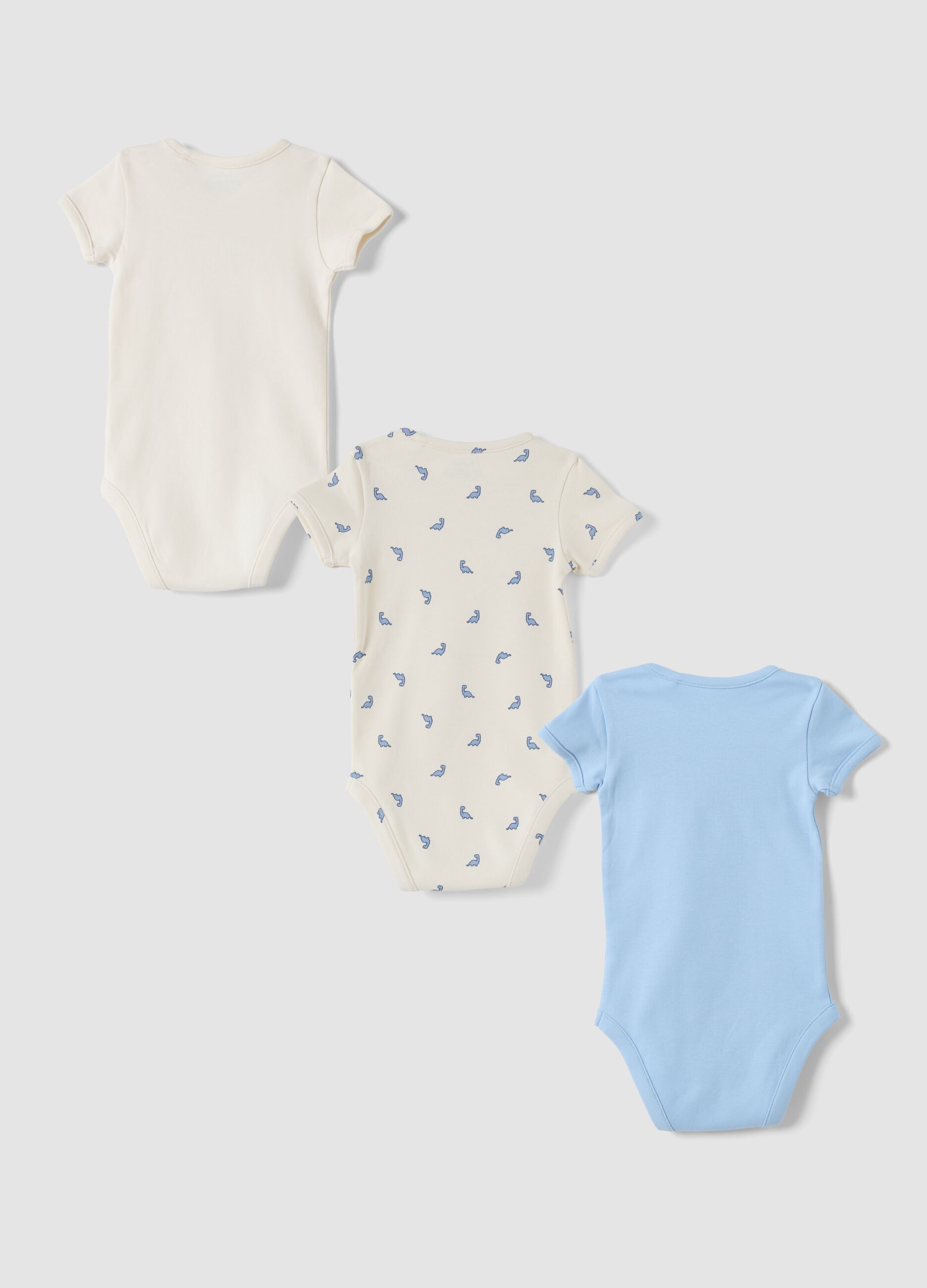Tripack di body azzurri e bianchi in puro cotone organico con fantasia