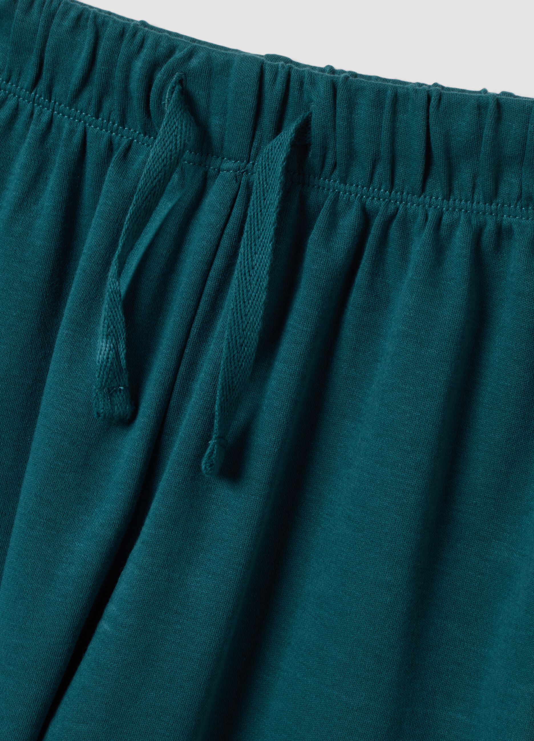 Pigiama verde in puro cotone organico con stampa dinosauro regular fit