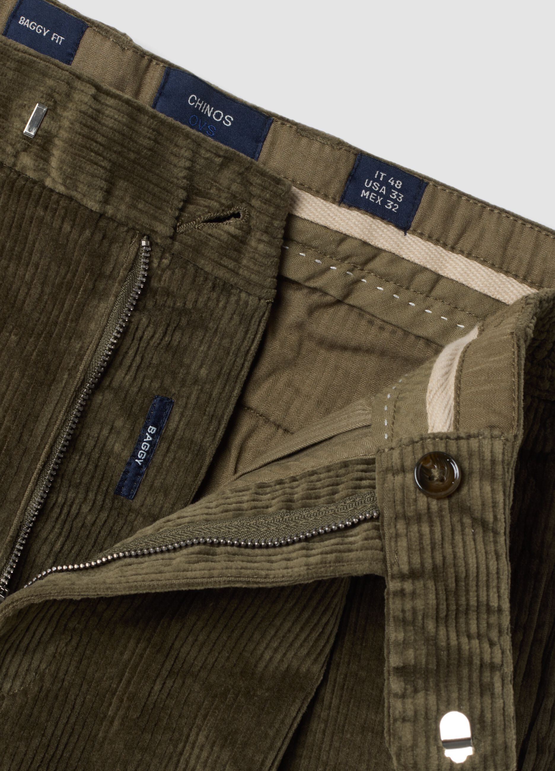 Pantaloni chino verdi in cotone elasticizzato baggy fit a coste
