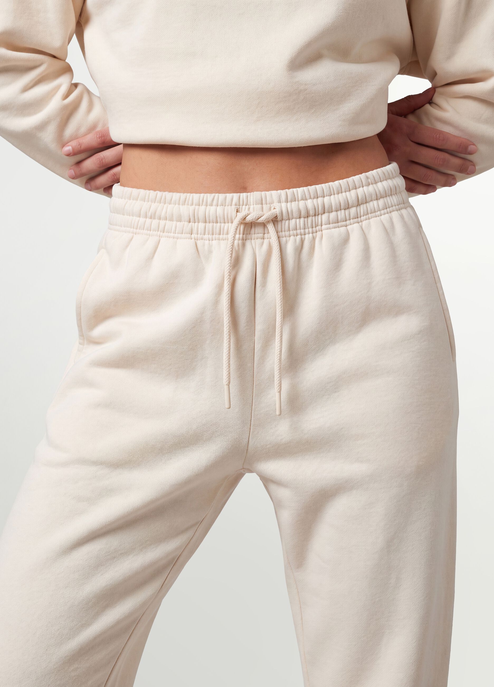 White cotton-blend joggers with elasticated waistband, regular fit