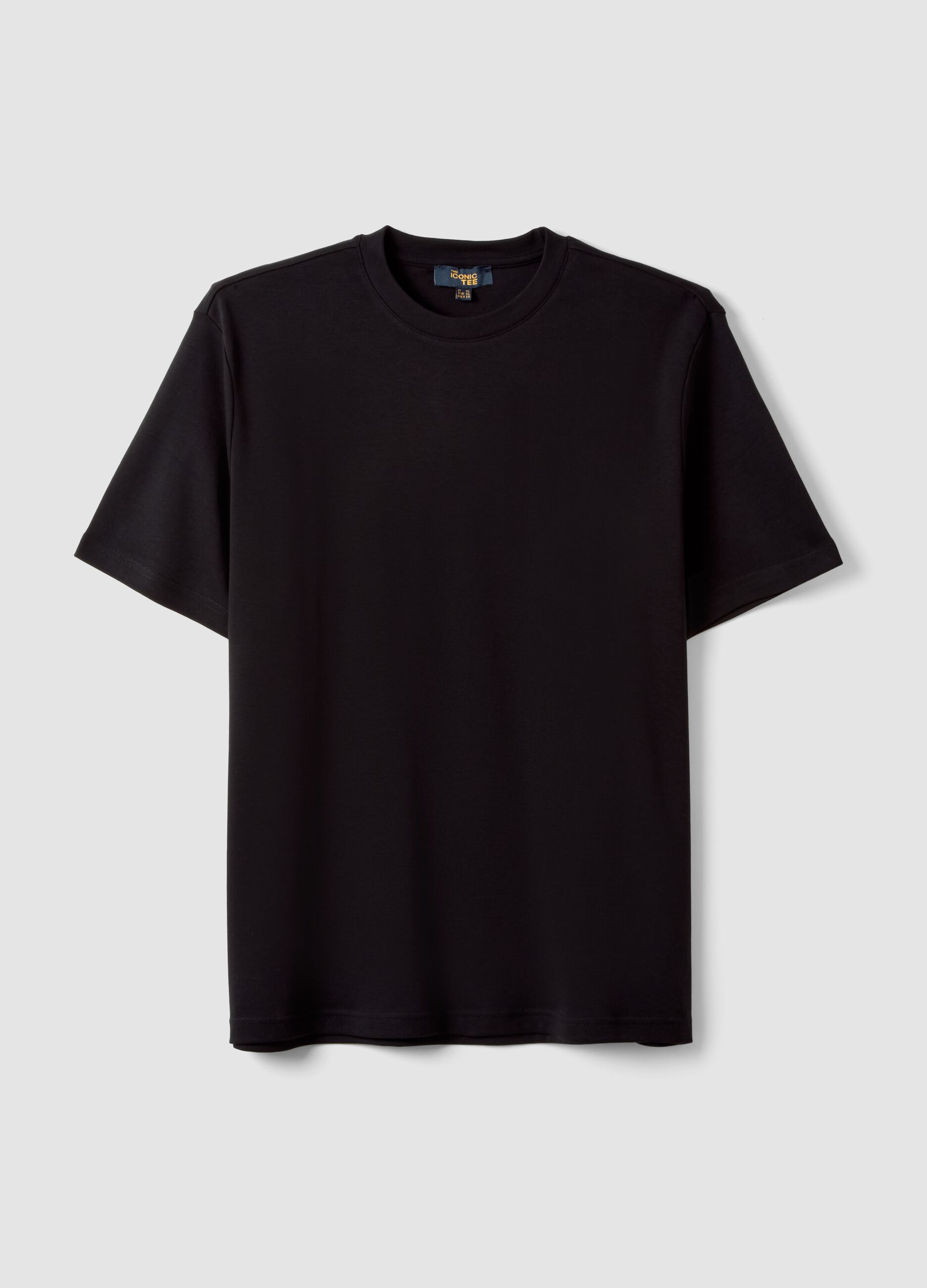 تيشيرت The Iconic Tee أسود من قطن خالص بأكمام قصيرة وقصّة عادية