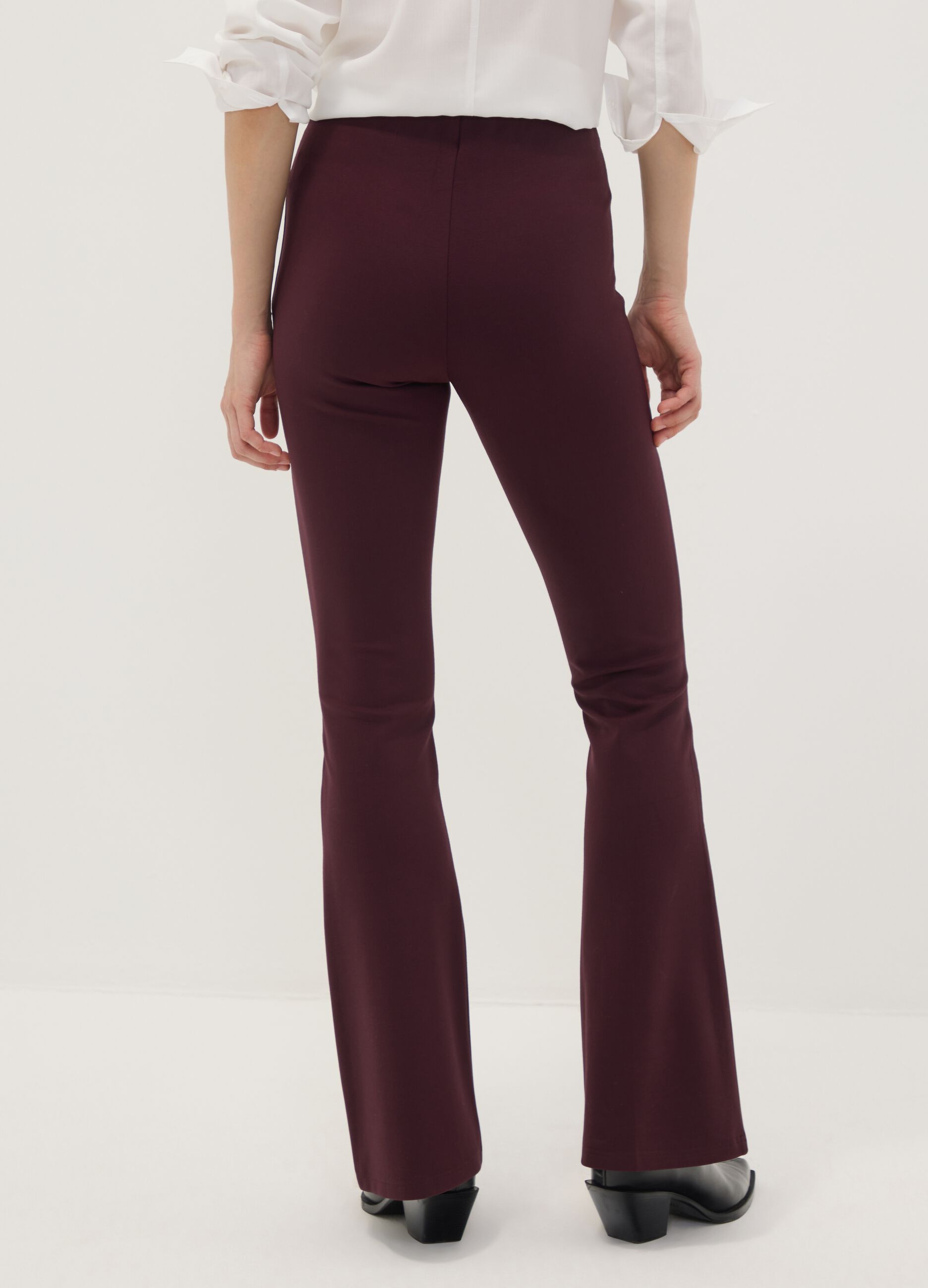 Burgundy flared leggings in stretch viscose Milano knit