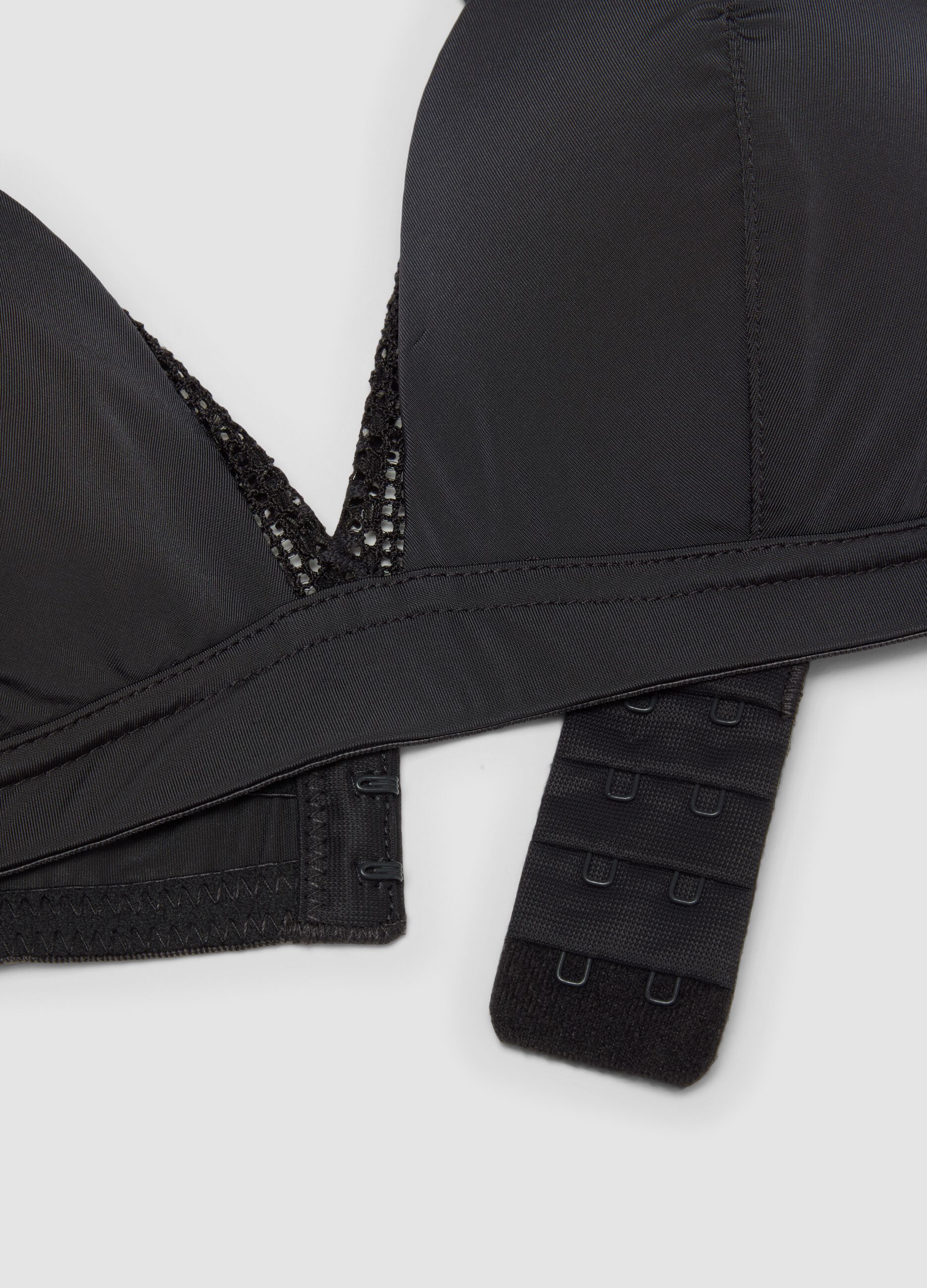 Black triangle bra in stretch fabric with removable padding