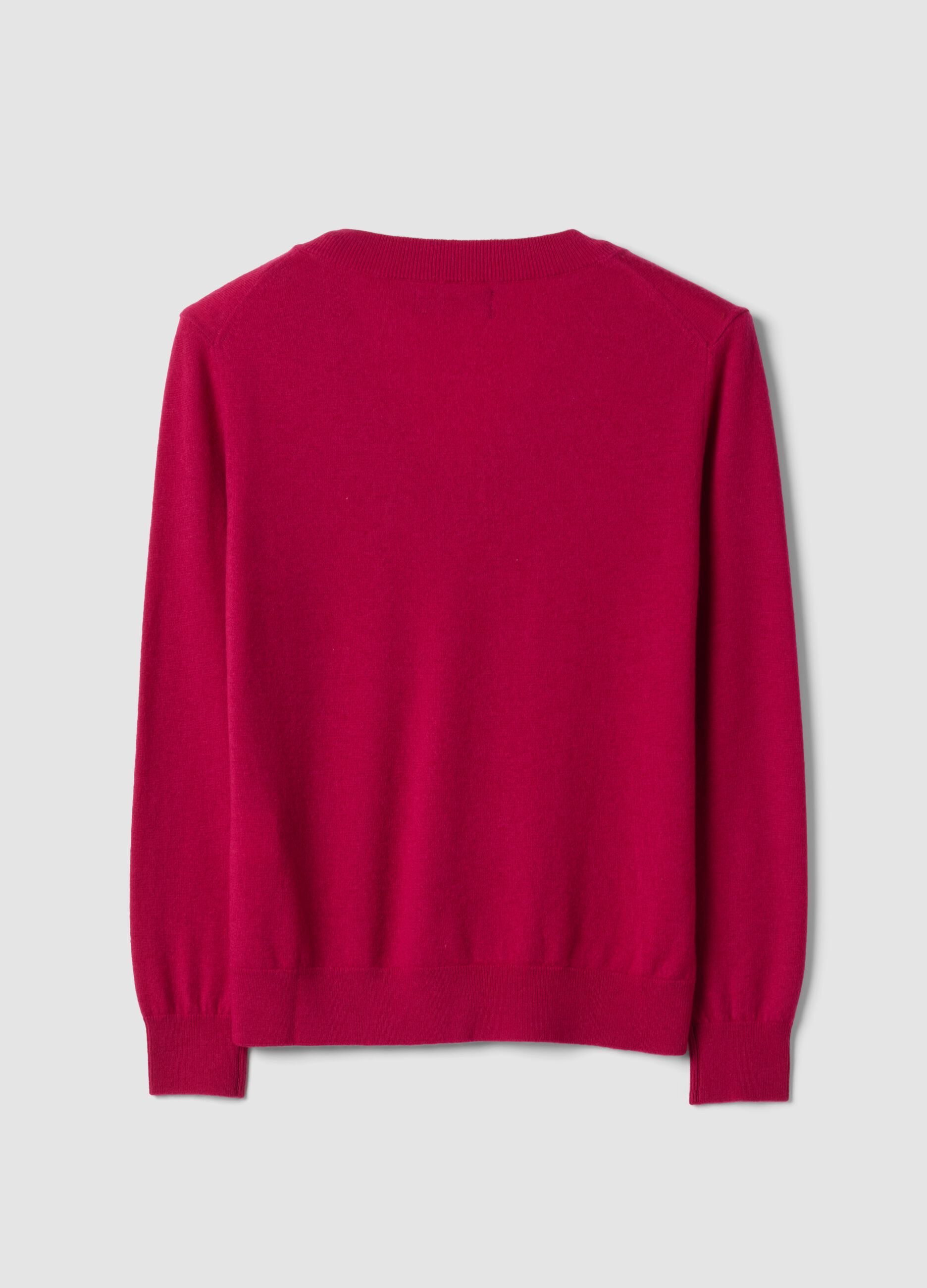 Maglia rossa in pura lana con scollo profondo a V