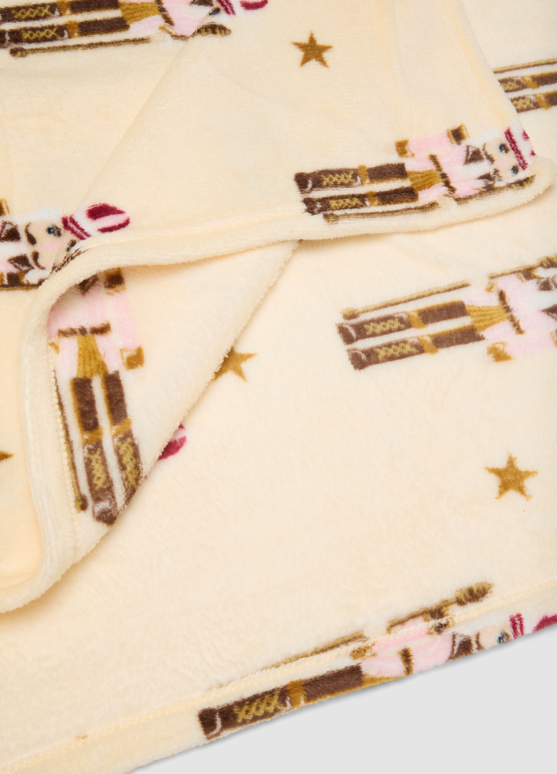 Coperta rosa e marrone con stampa natalizia