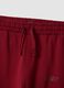 Red relaxed-fit joggers in pure organic cotton with check print_1