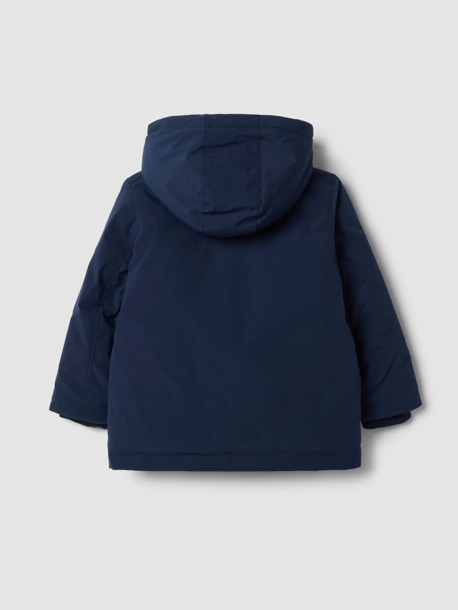 Long padded navy parka with detachable hood, oversized fit_1