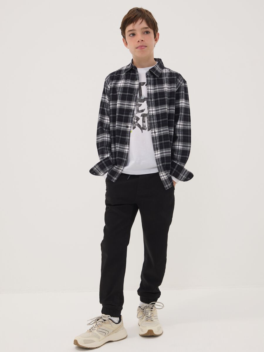 Black stretch-cotton denim joggers with elasticated waistband for boys_1
