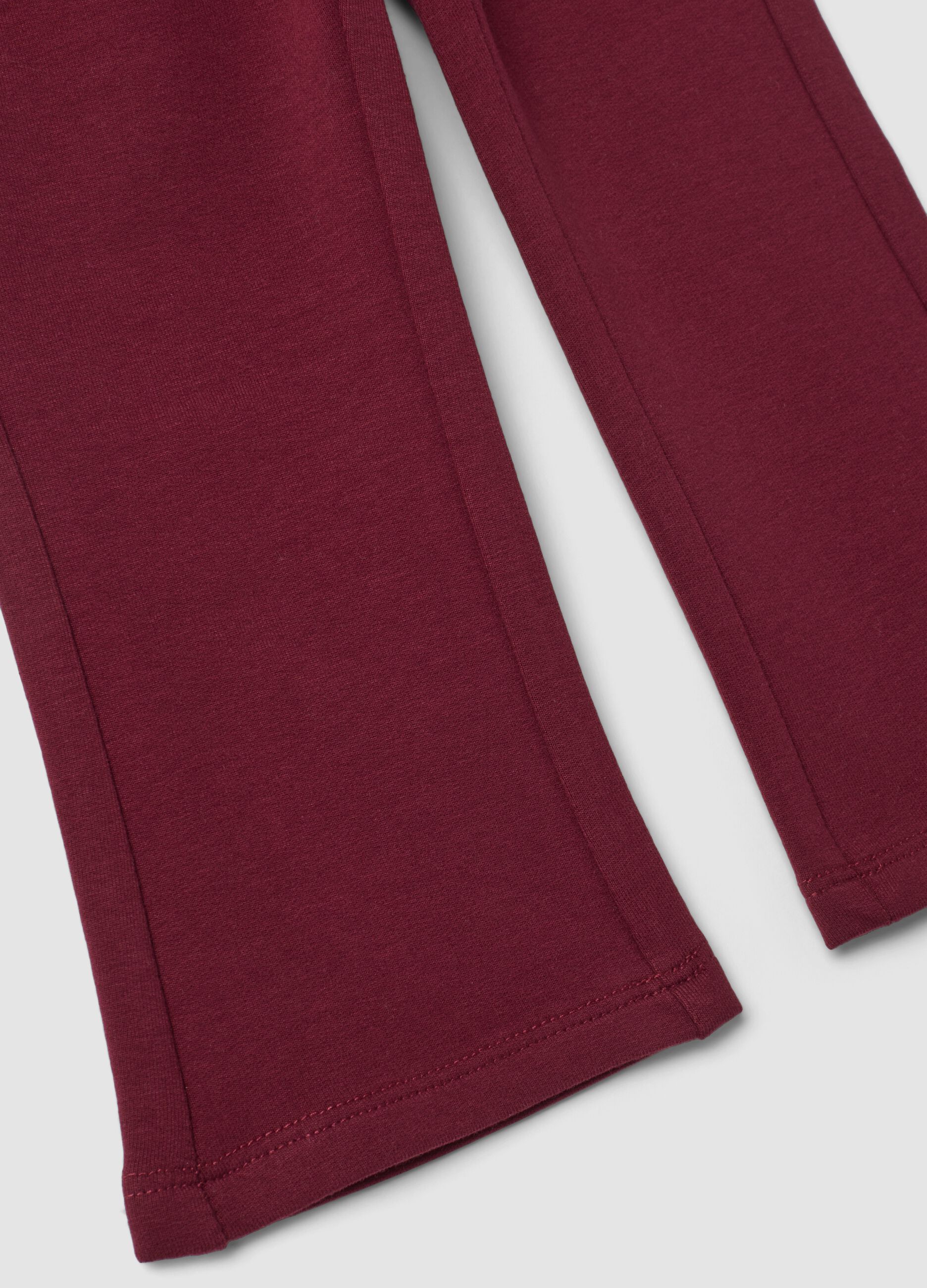 Red flared leggings in stretchy organic cotton