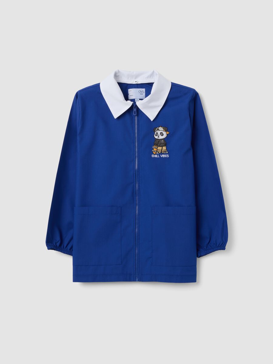 Customisable blue school smock with zip and panda embroidery for boys_0