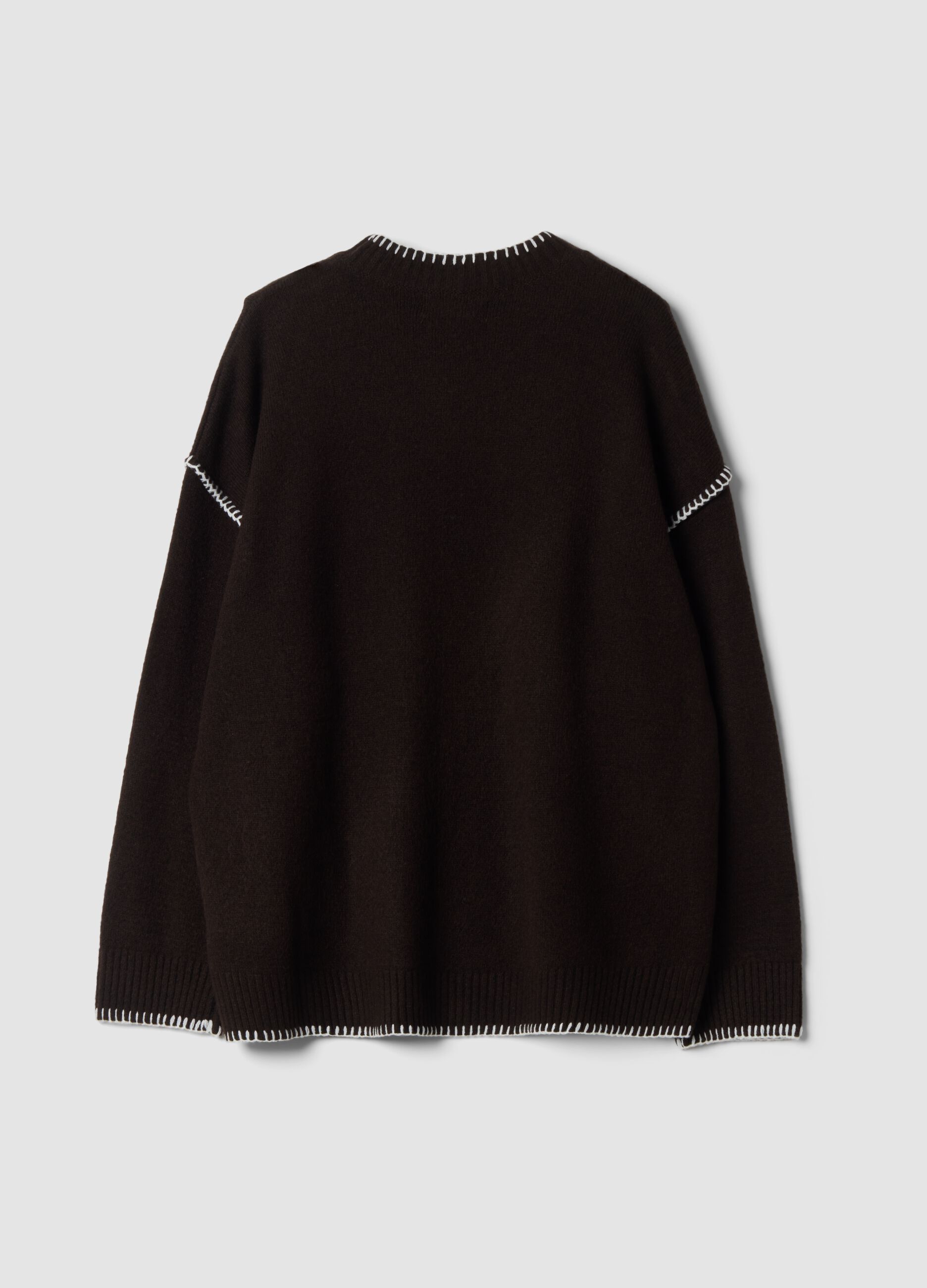 Brown stretch wool jumper with exposed seams, oversized fit