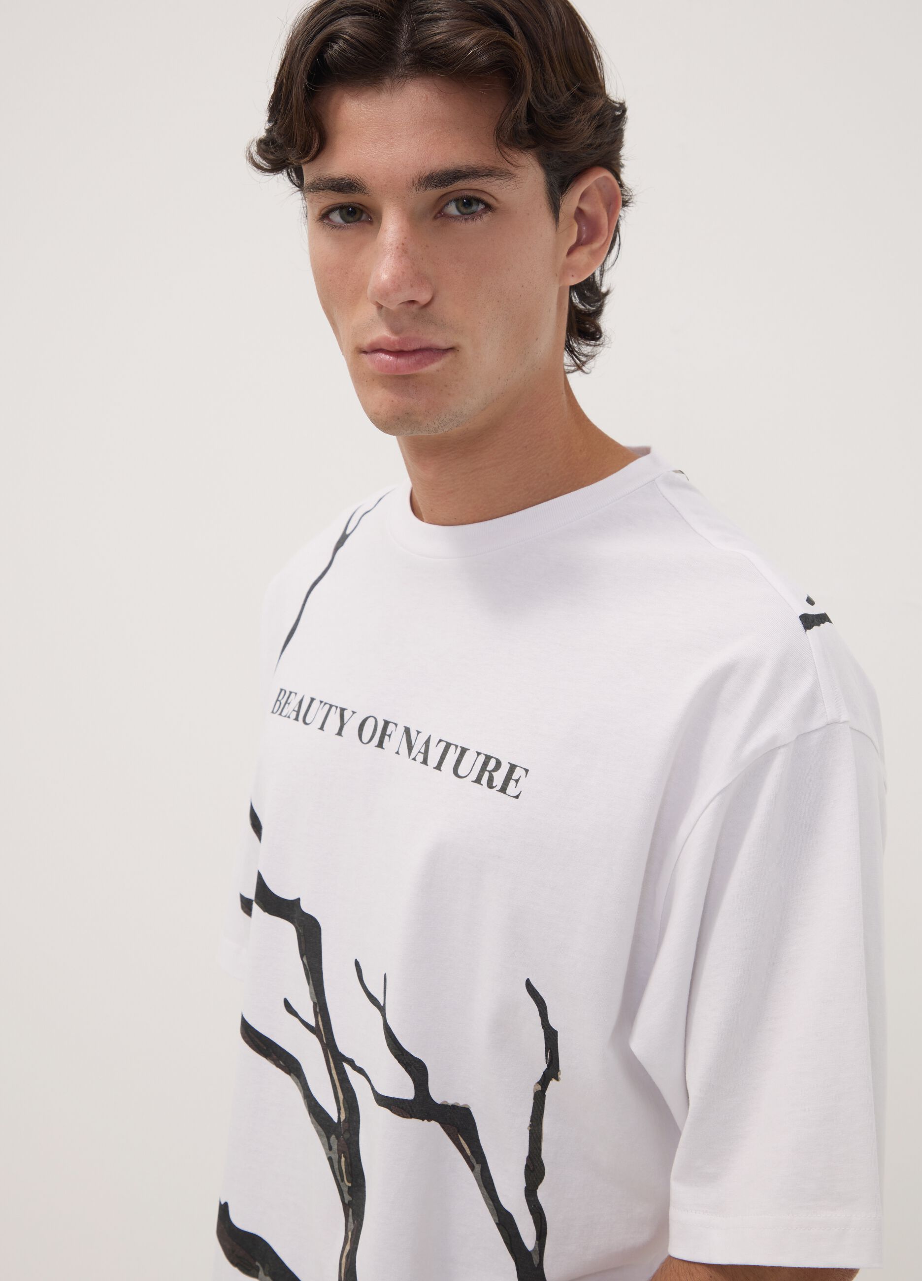 White pure cotton T-shirt with foliage print
