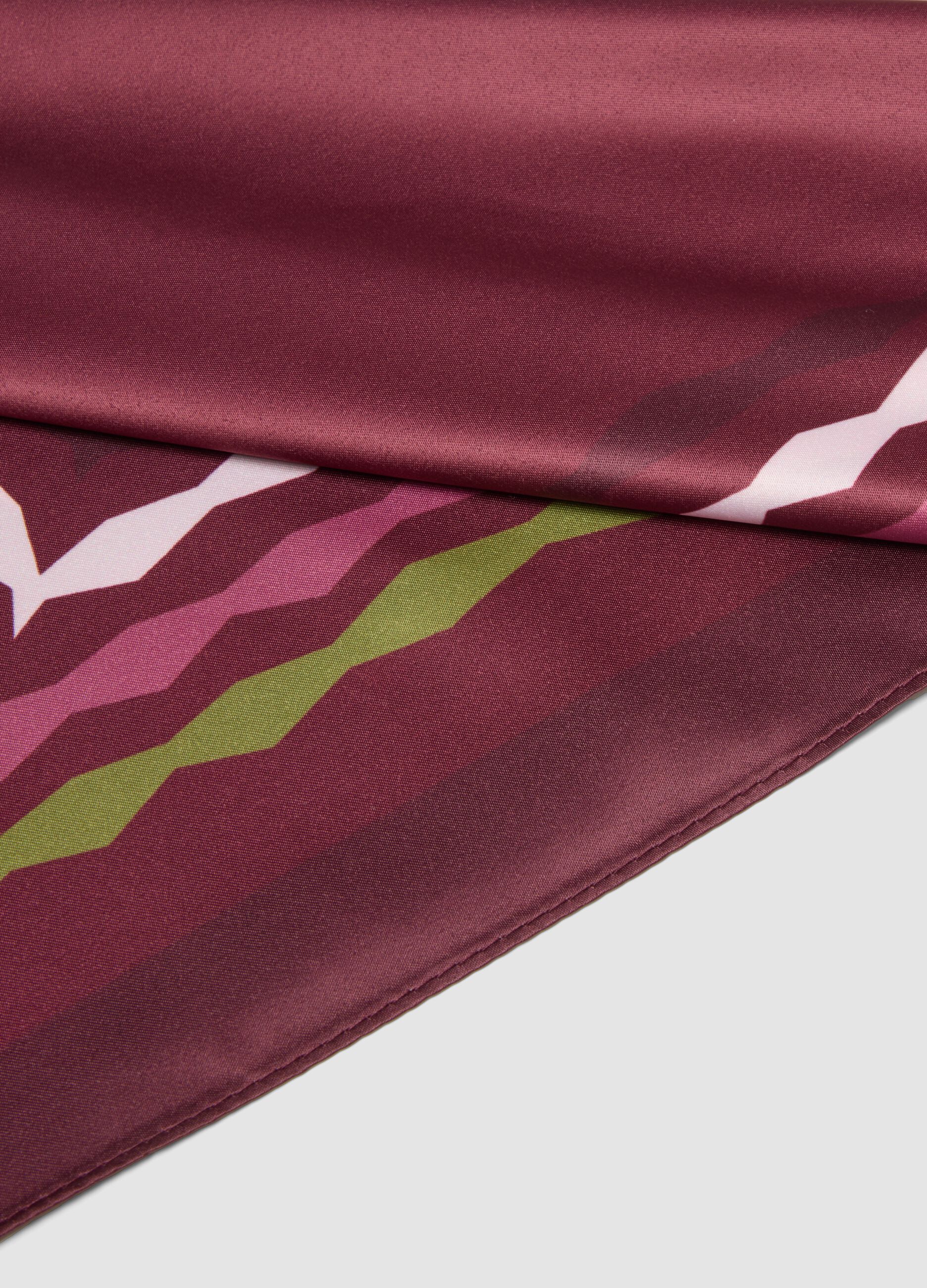 Brown scarf with contrasting geometric pattern
