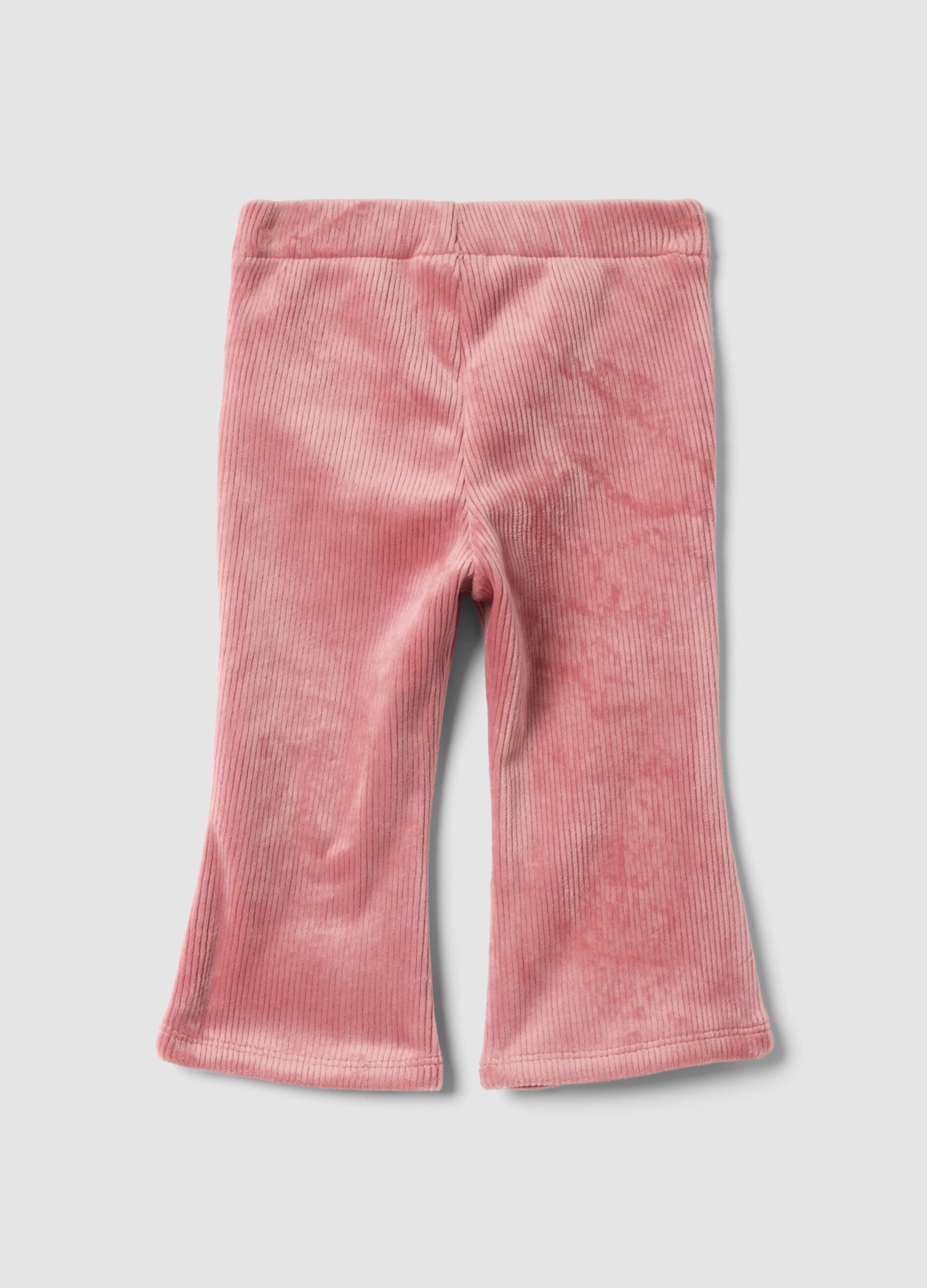 Pantaloni flare rosa in tessuto elasticizzato a costine