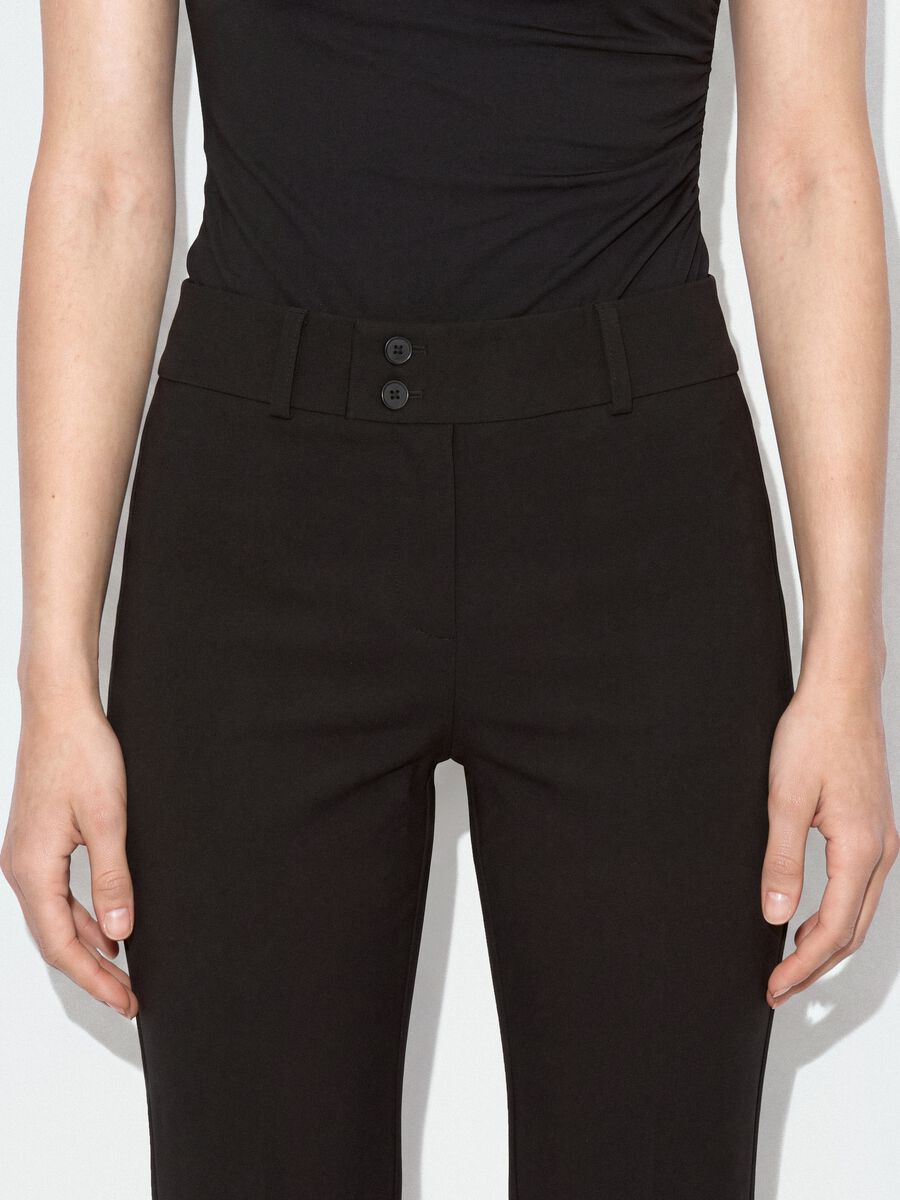 Black flared trousers in stretch viscose_3