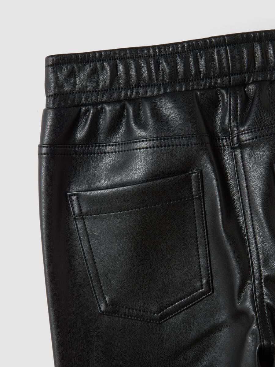 Black flared trousers with elasticated waist_3