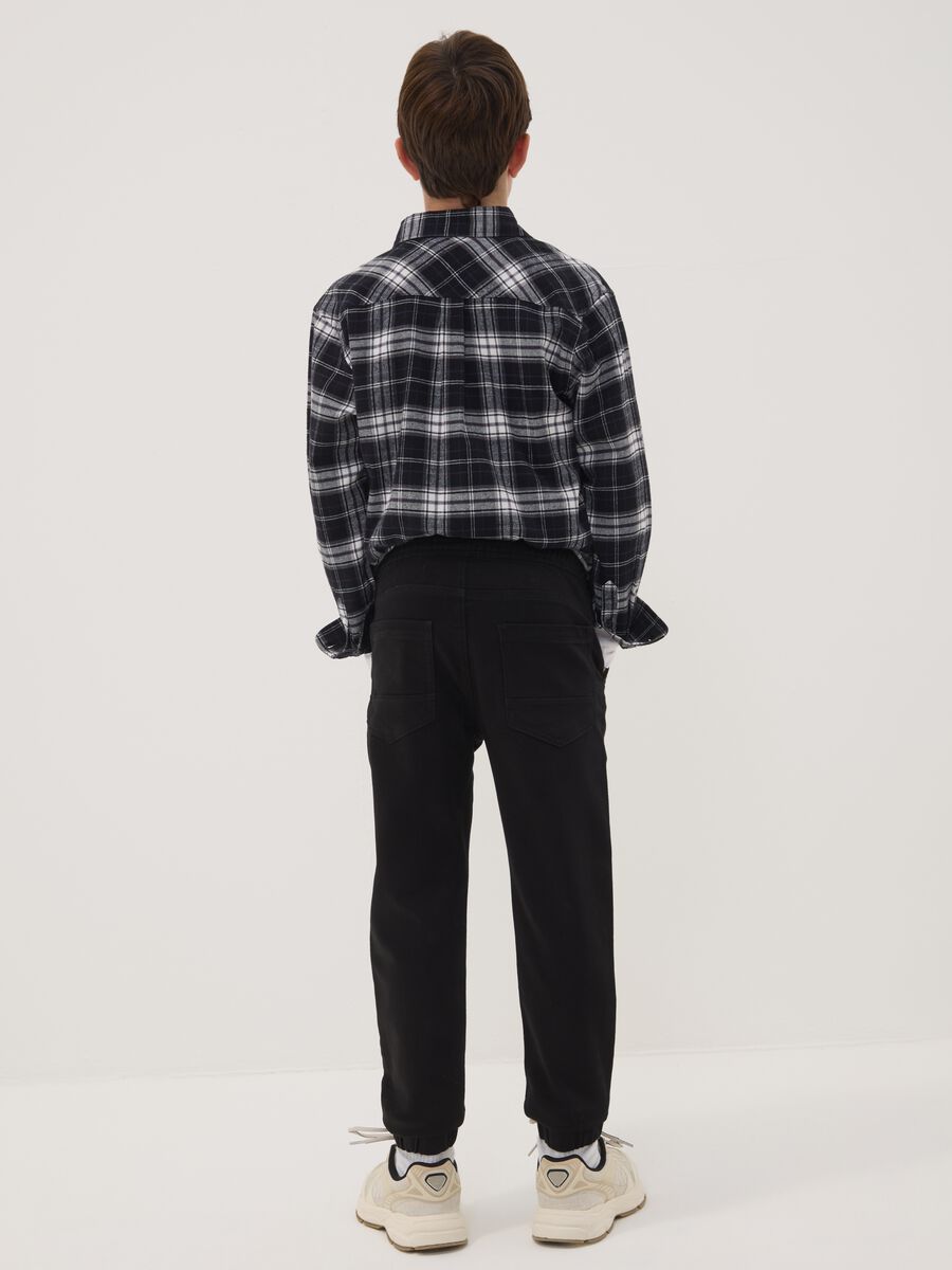 Black stretch-cotton denim joggers with elasticated waistband for boys_2