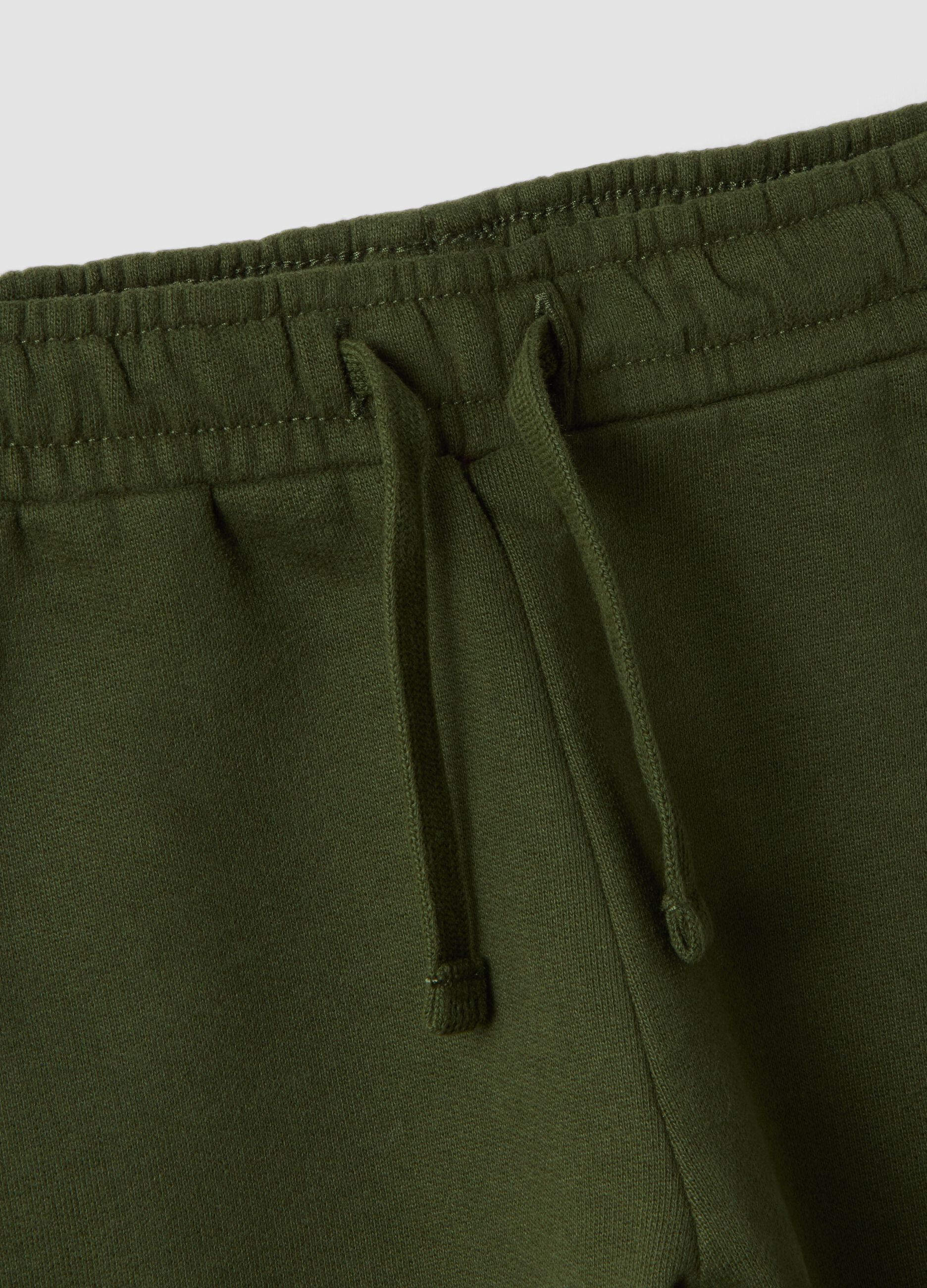 Green pure cotton over-fit joggers with teddy bear print