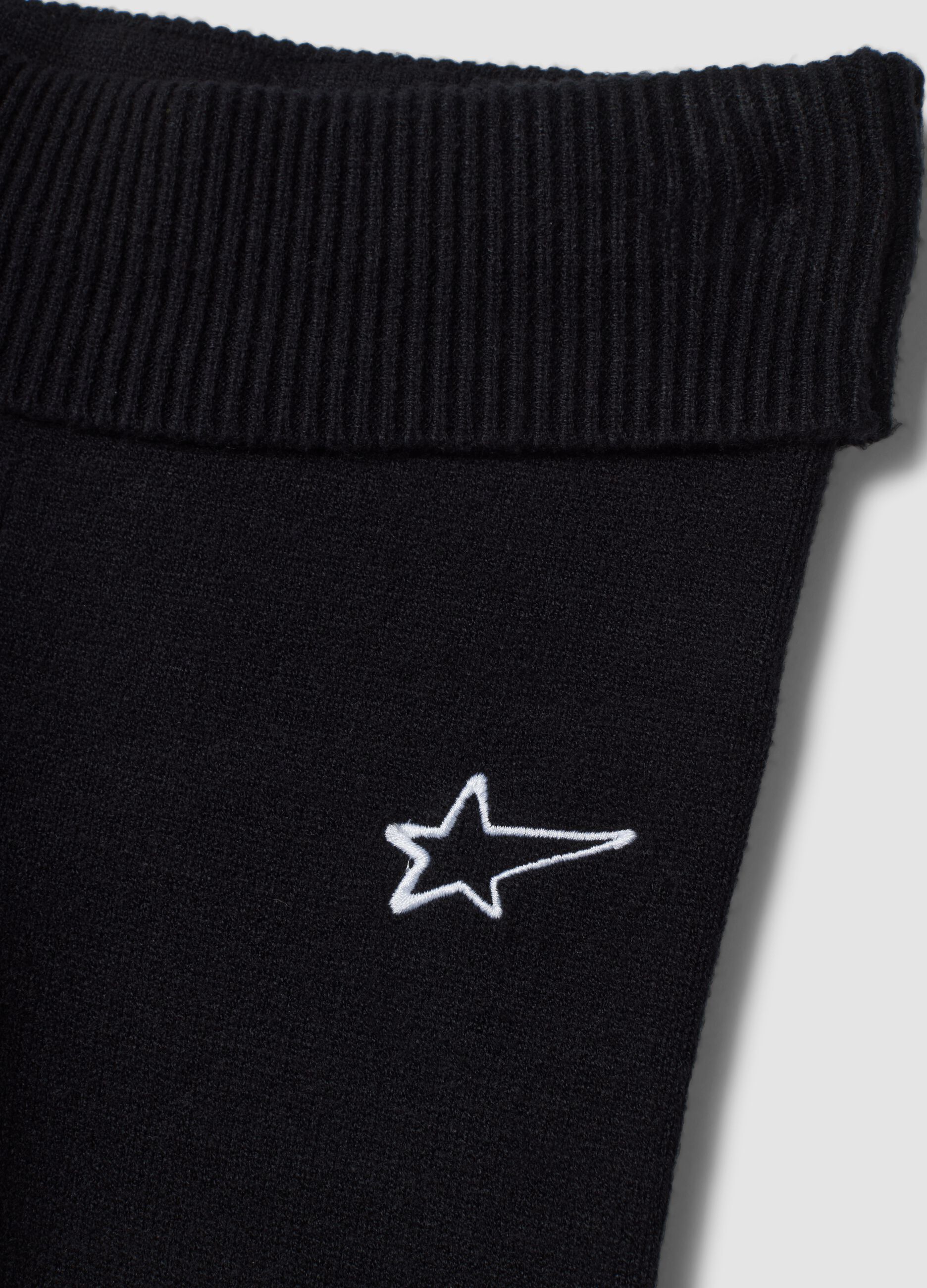 Black flared viscose-blend leggings with star embroidery