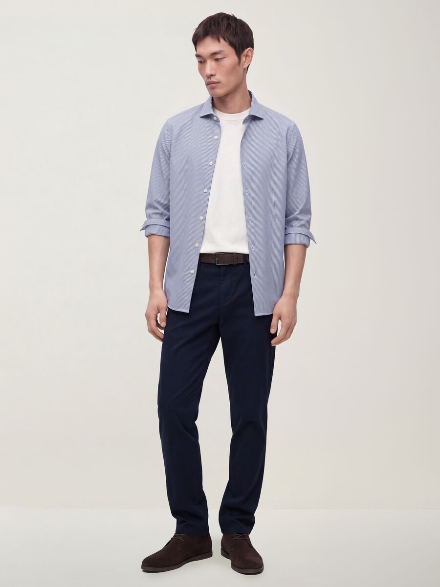 Pantaloni chino blu in twill di cotone elasticizzato slim fit_0