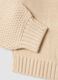 Cardigan beige in maglia con scollo profondo a V_3