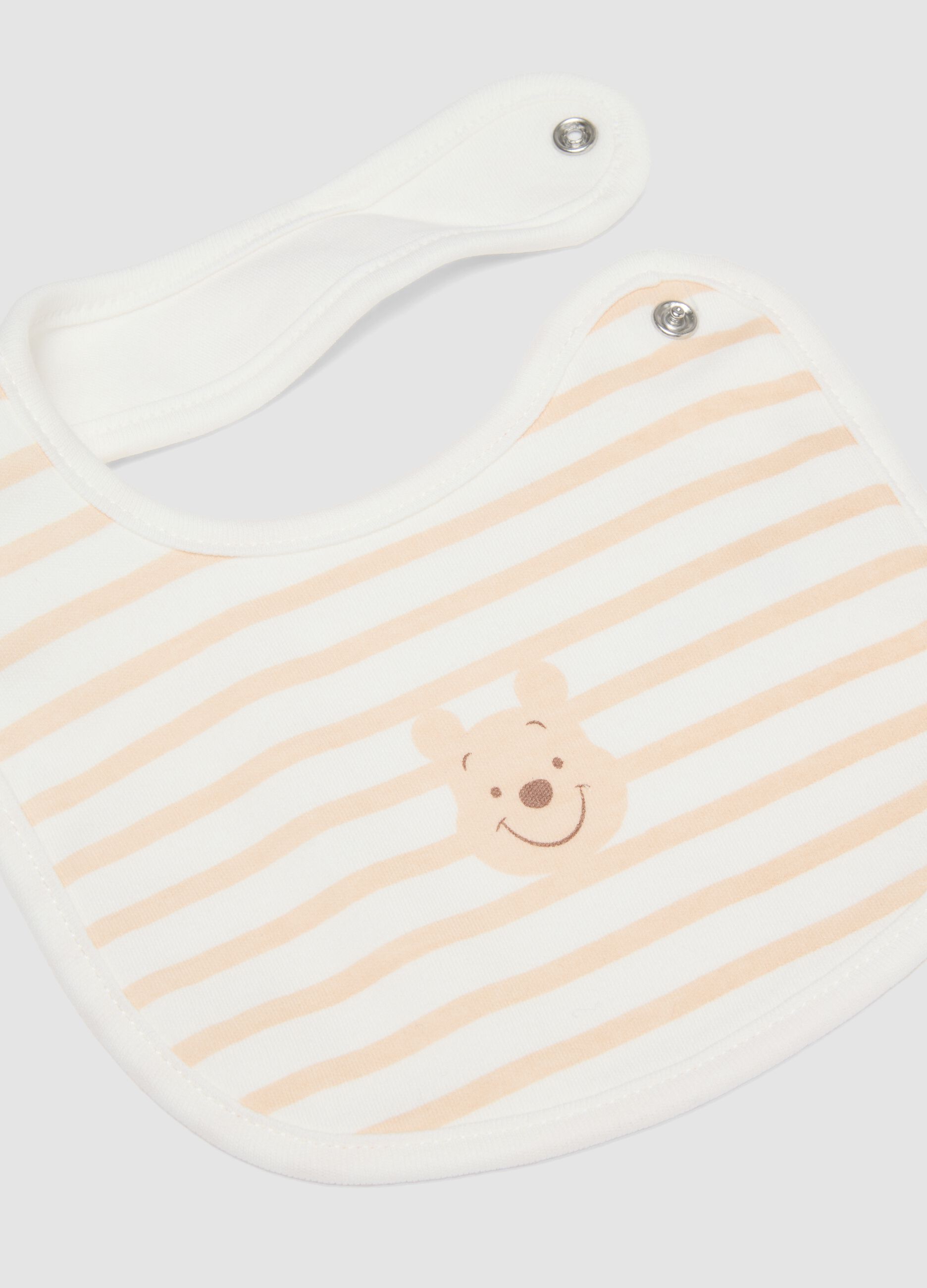 2-pack of white organic cotton Winnie the Pooh bibs