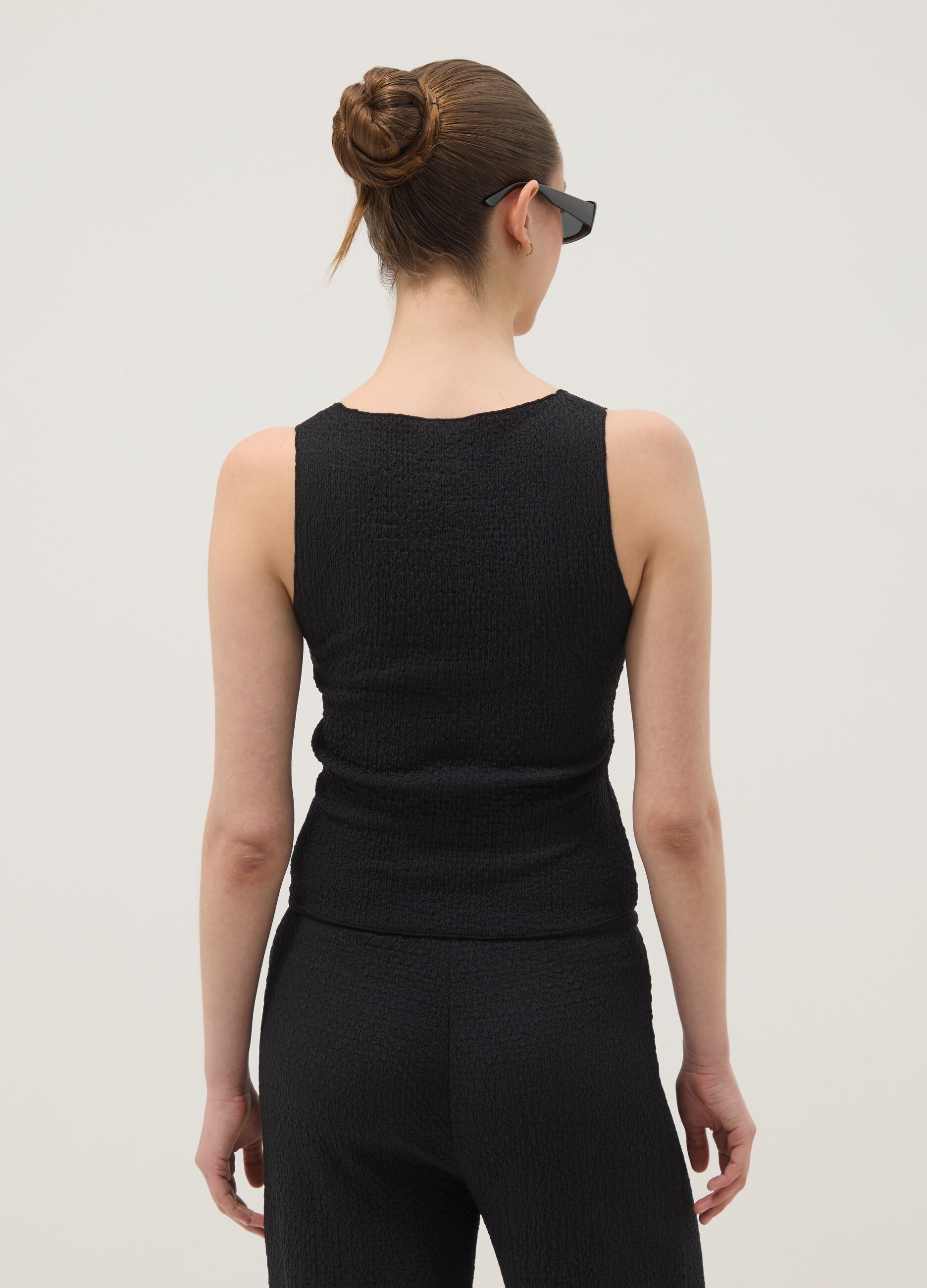 Black stretch tank top with crinkled texture