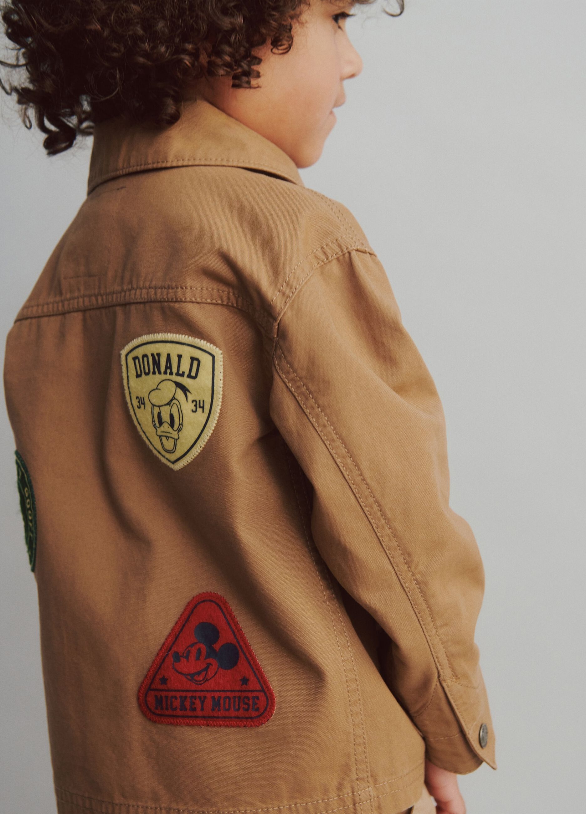 Brown cotton jacket with Disney patches