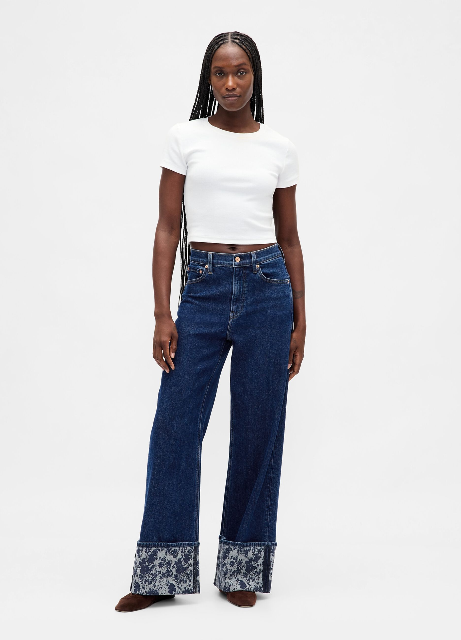 Wide denim trousers with floral turn-up