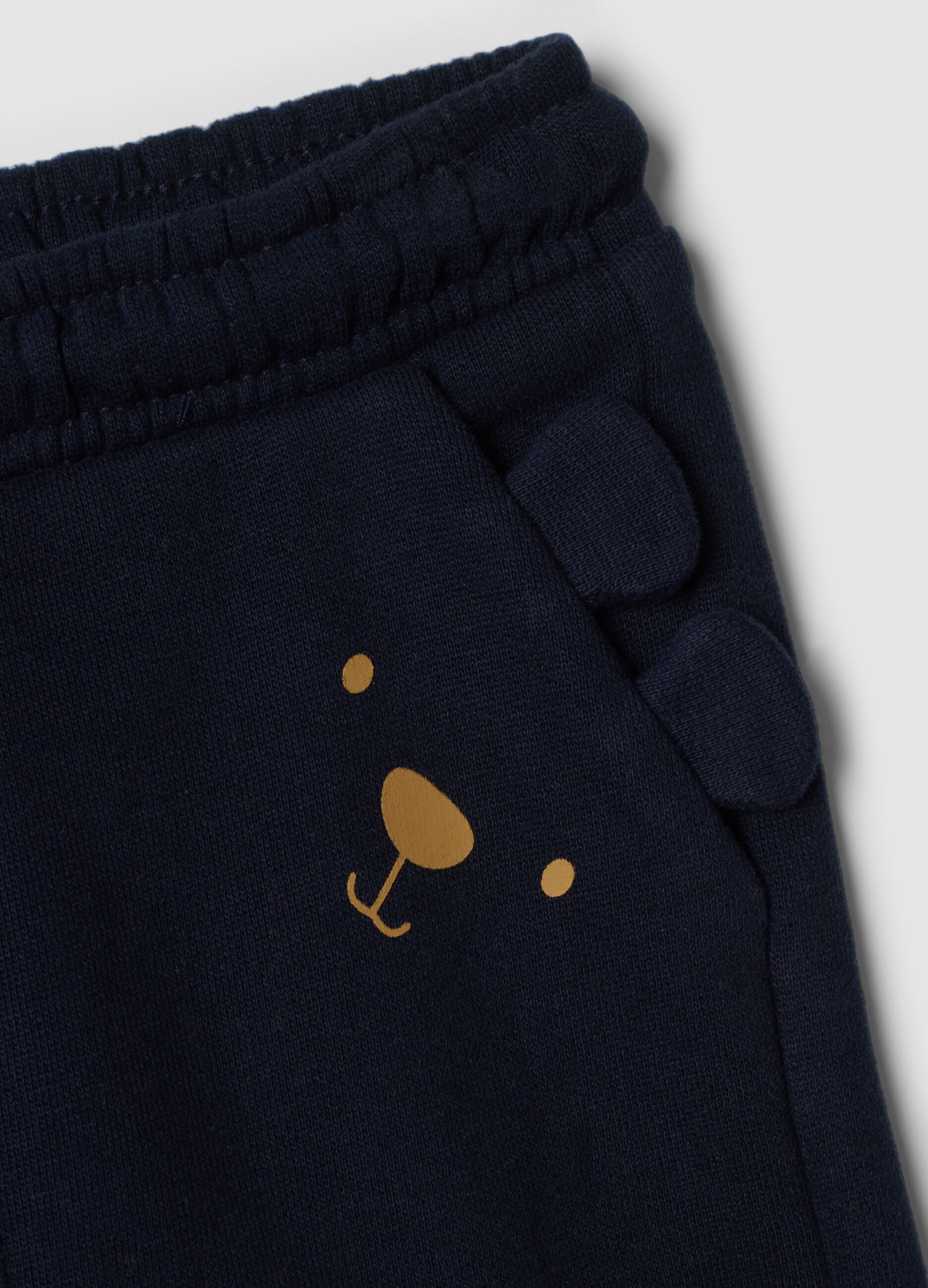 Pantaloni jogger blu in puro cotone con motivo animalier