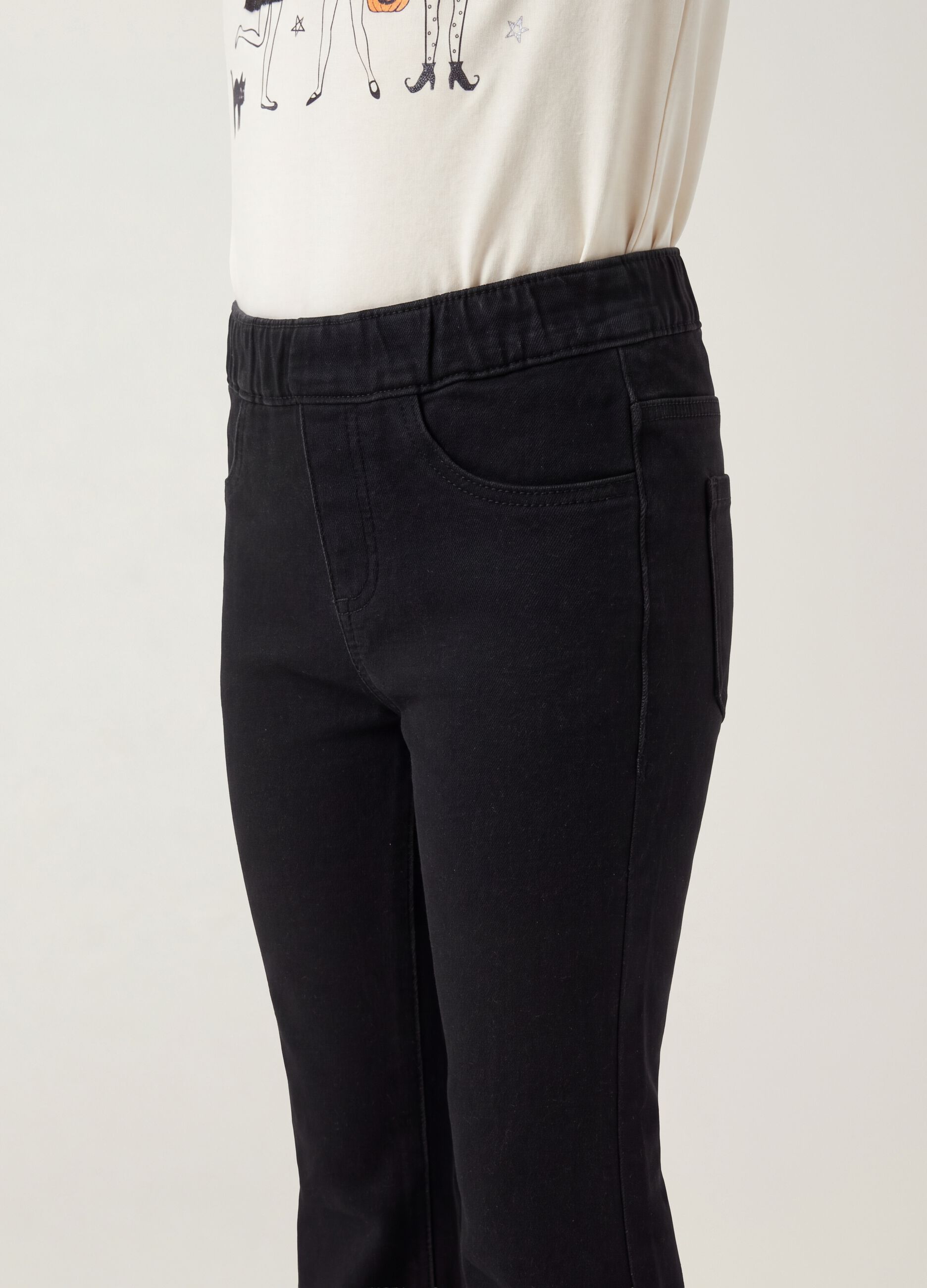 Jeggings nero flare in cotone elasticizzato per bambina