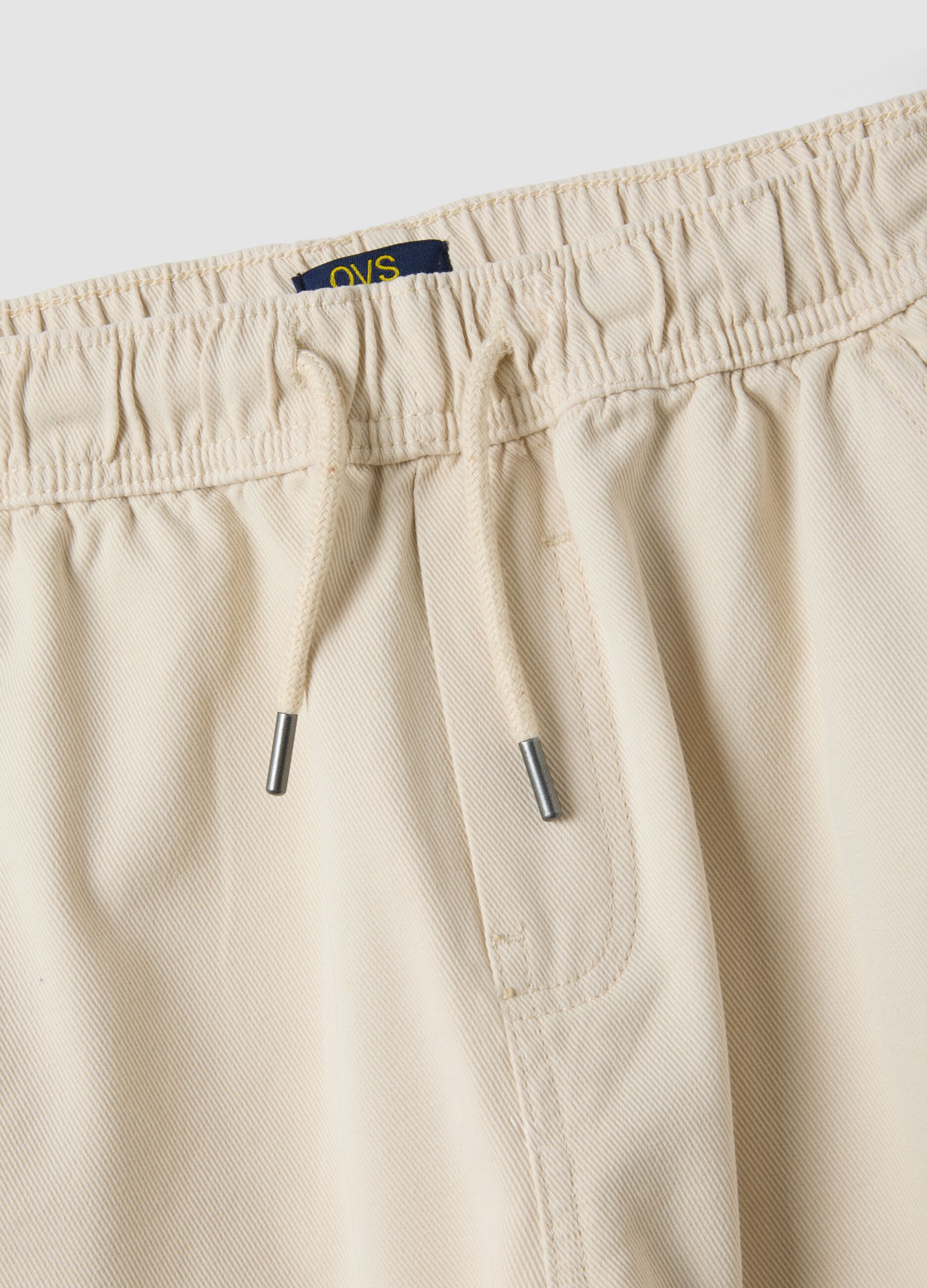 Beige stretch cotton trousers with elasticated waist, comfort fit