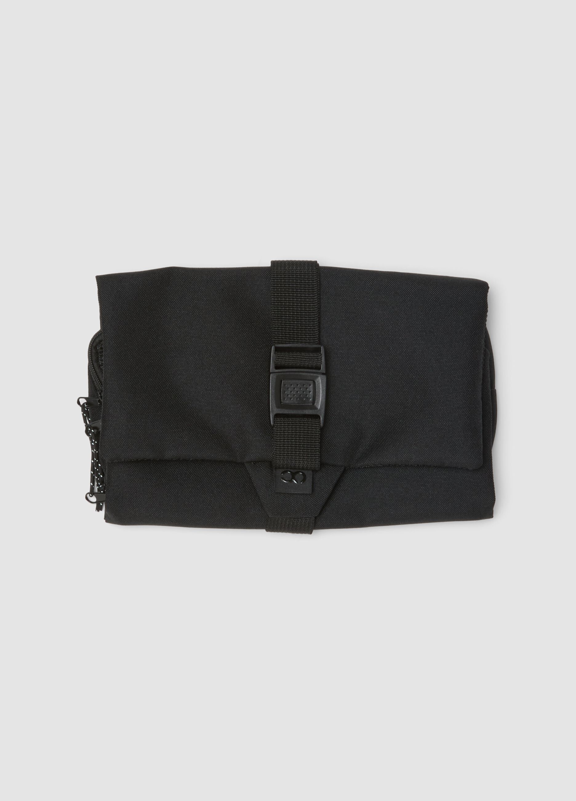 Black foldable multi-compartment bag with inserts
