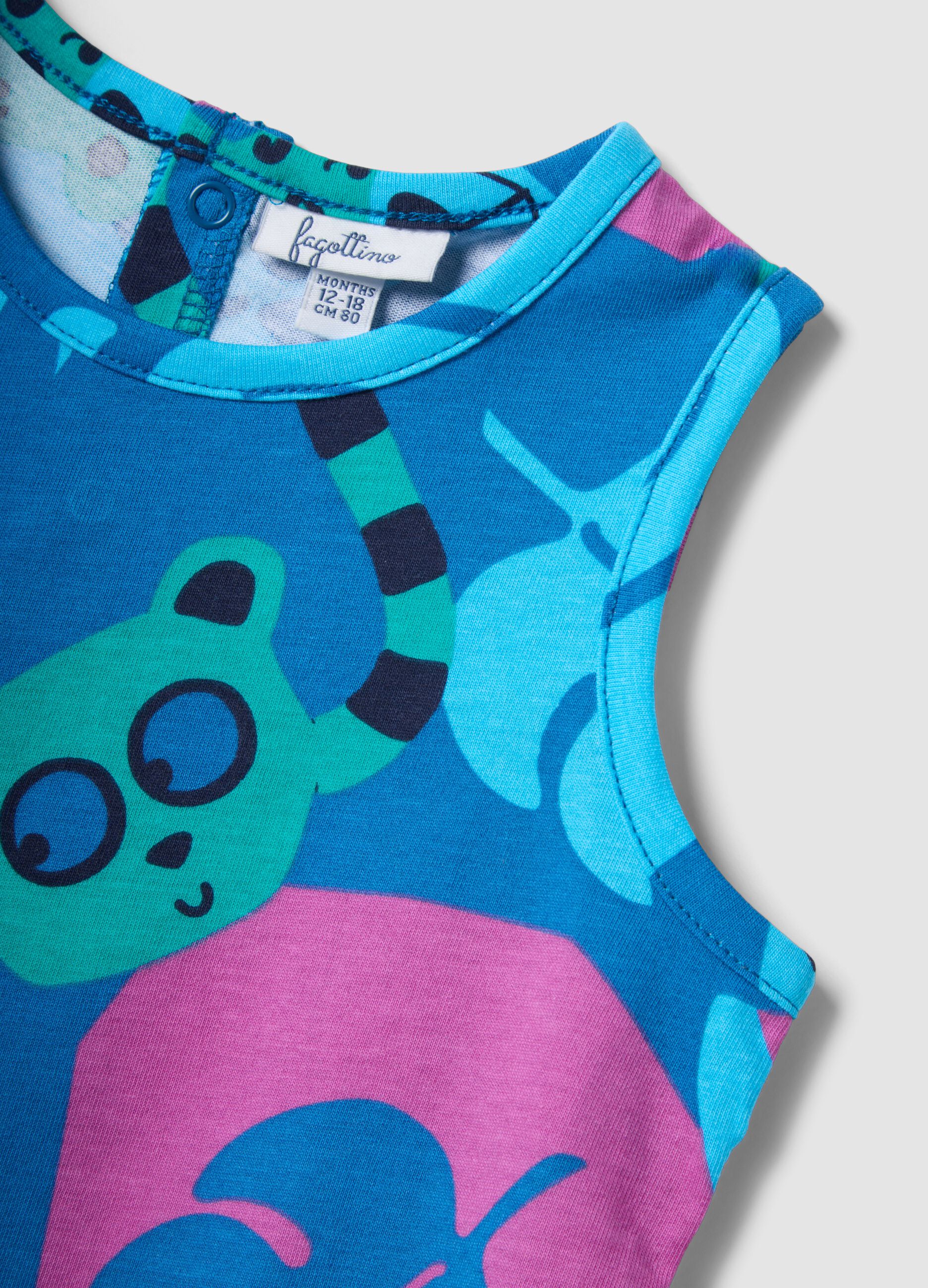 Blue organic cotton tank top with tropical print