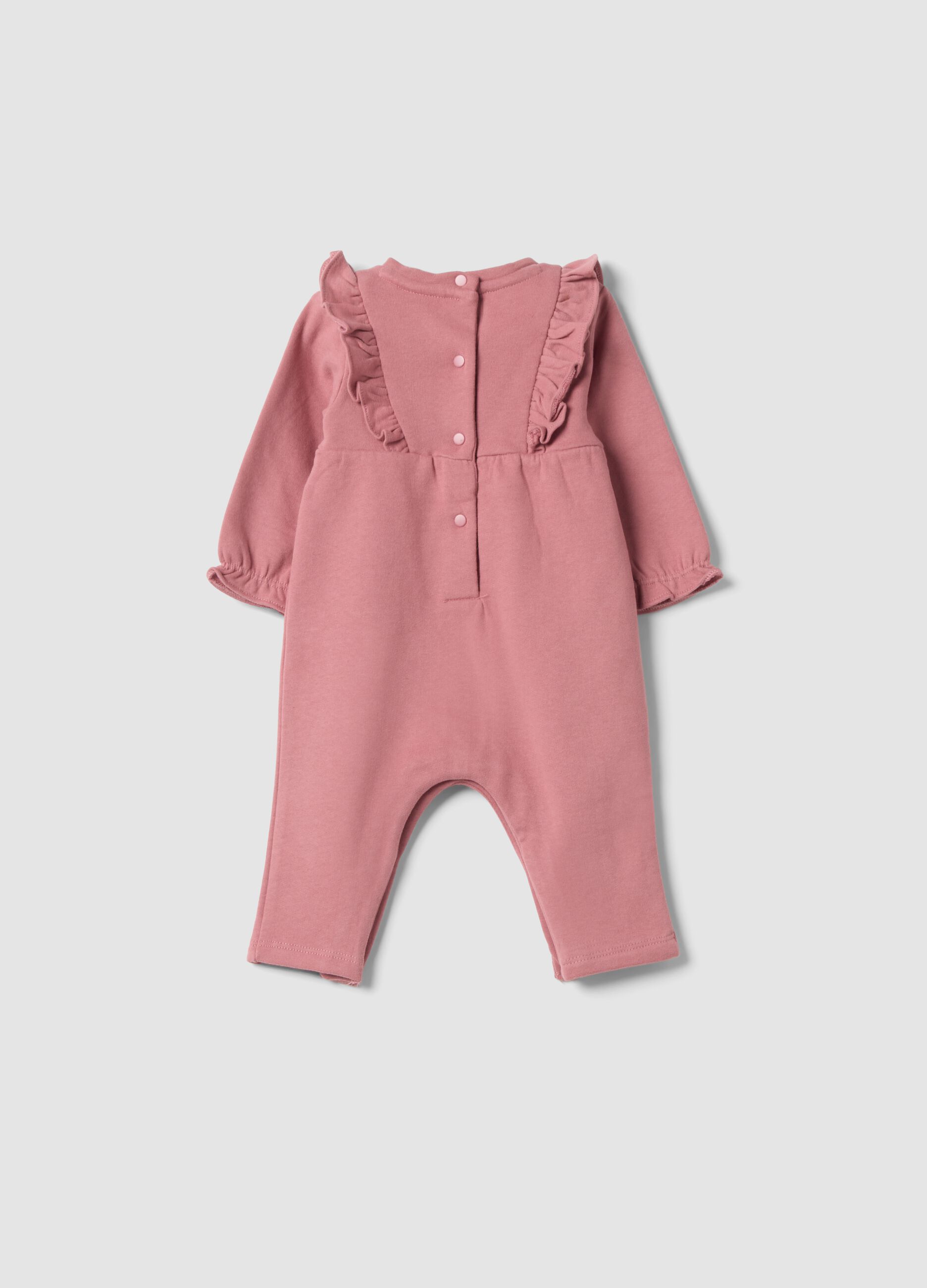 Pink organic cotton sleepsuit with ruffles and chest embroidery