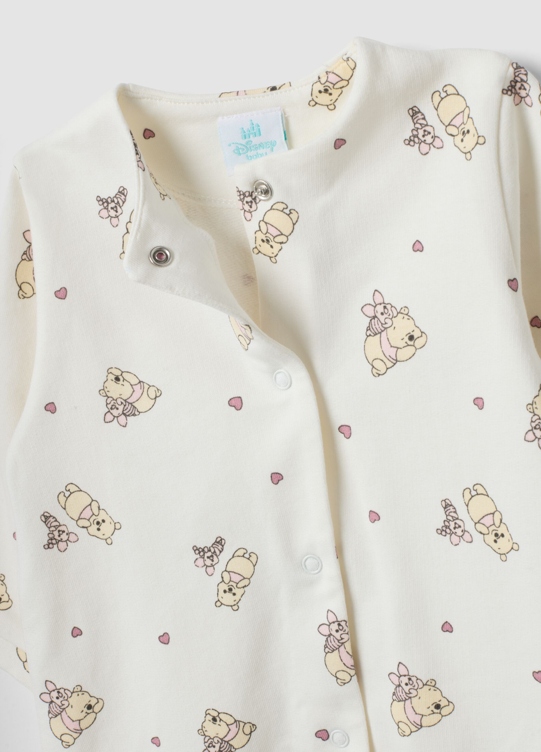 2-pack organic cotton baby sleepsuits with feet and Winnie the Pooh print