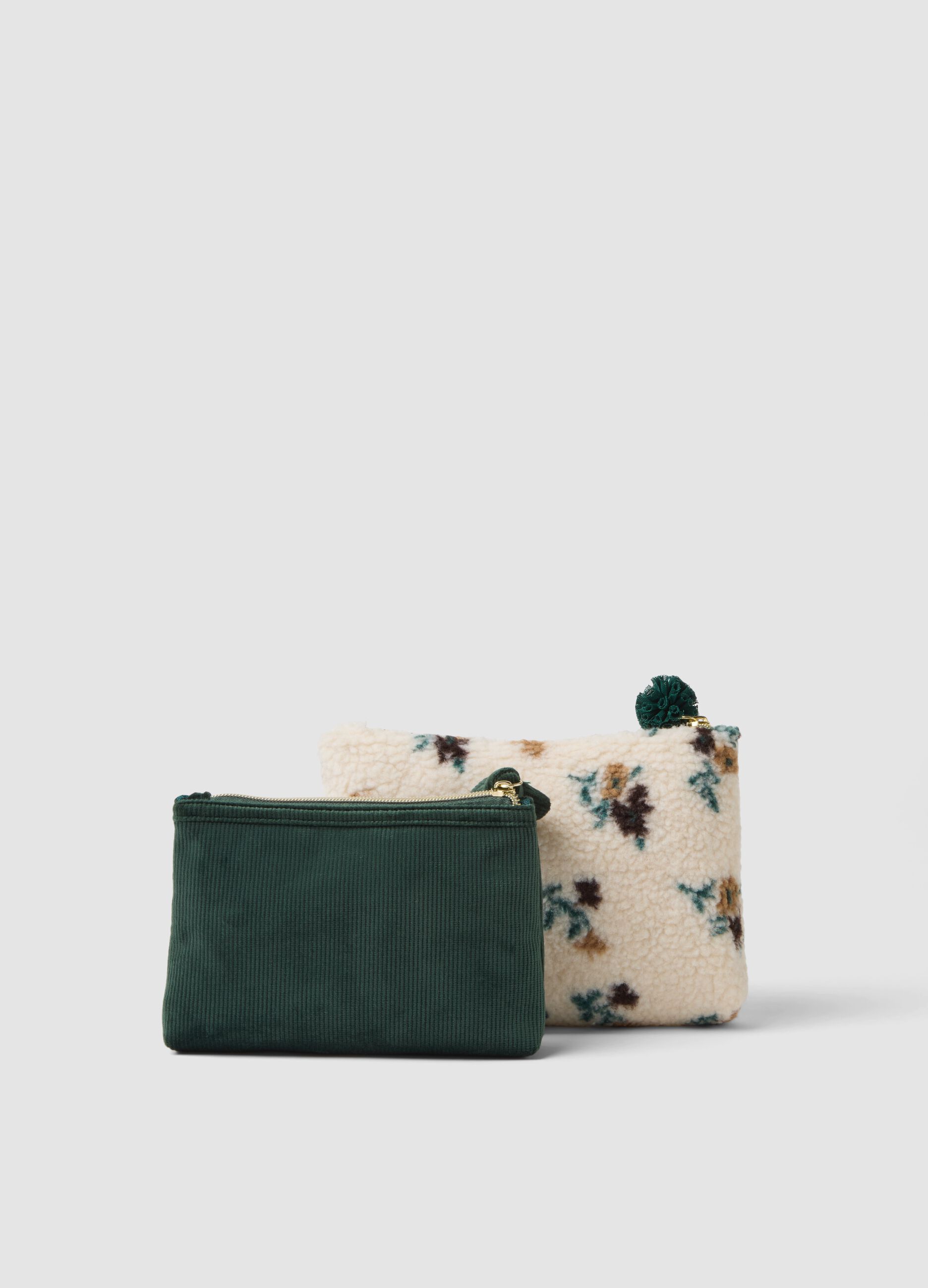 Set di due pochette bianche e verde con fantasia floreale